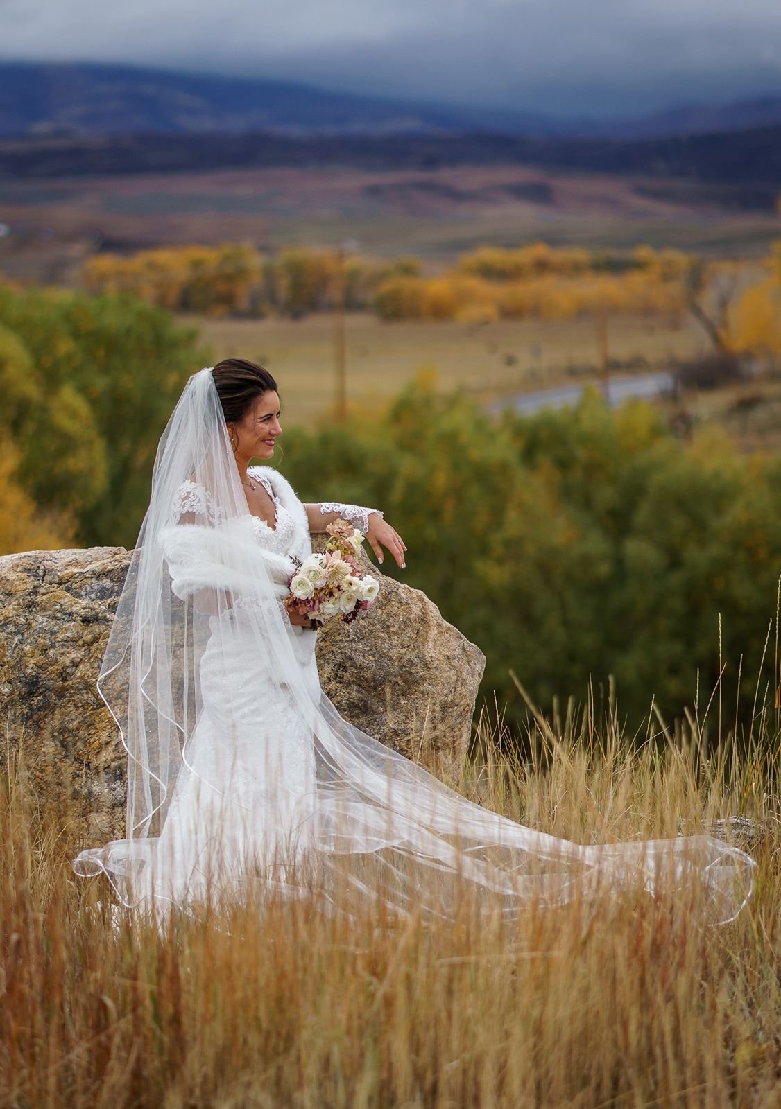 bride-in-fall-at-rock.jpg