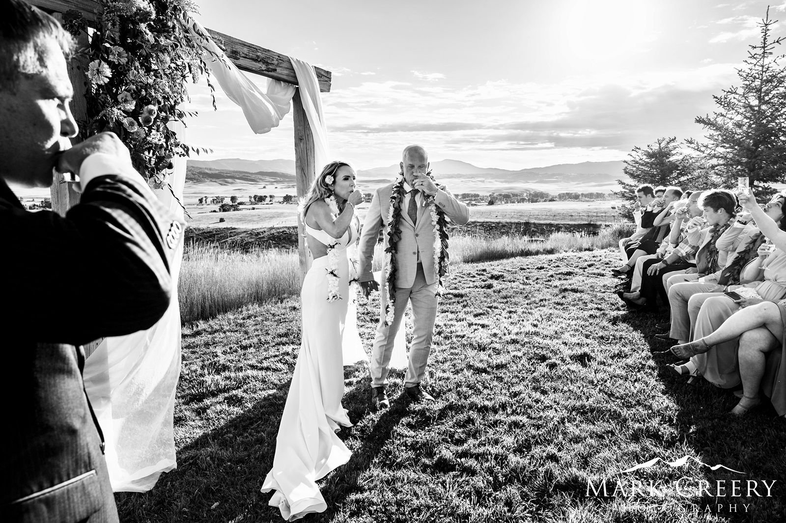 couple-toasting-at-ceremony-BW.jpg