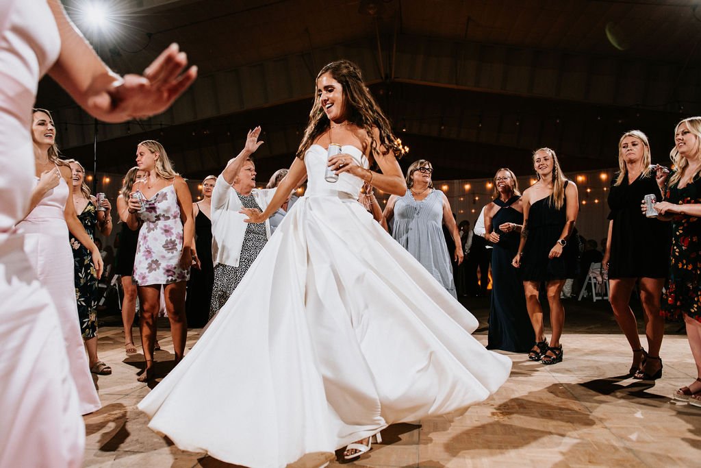 Bride twirling on dance floor