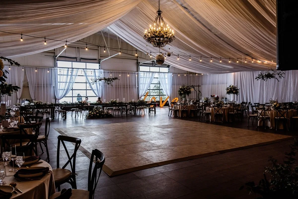 Wedding setup with crossed skis and florals for winter wedding in Steamboat Springs