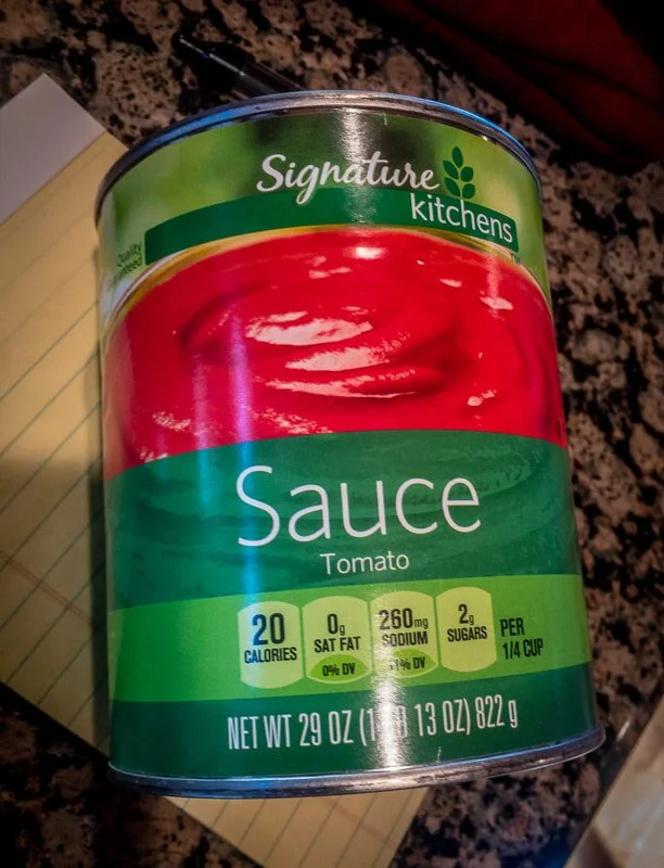 Cano of tomato sauce used in washer's game at La Joya Dulce ranch. Luxury wedding venue near Denver, Colorado.