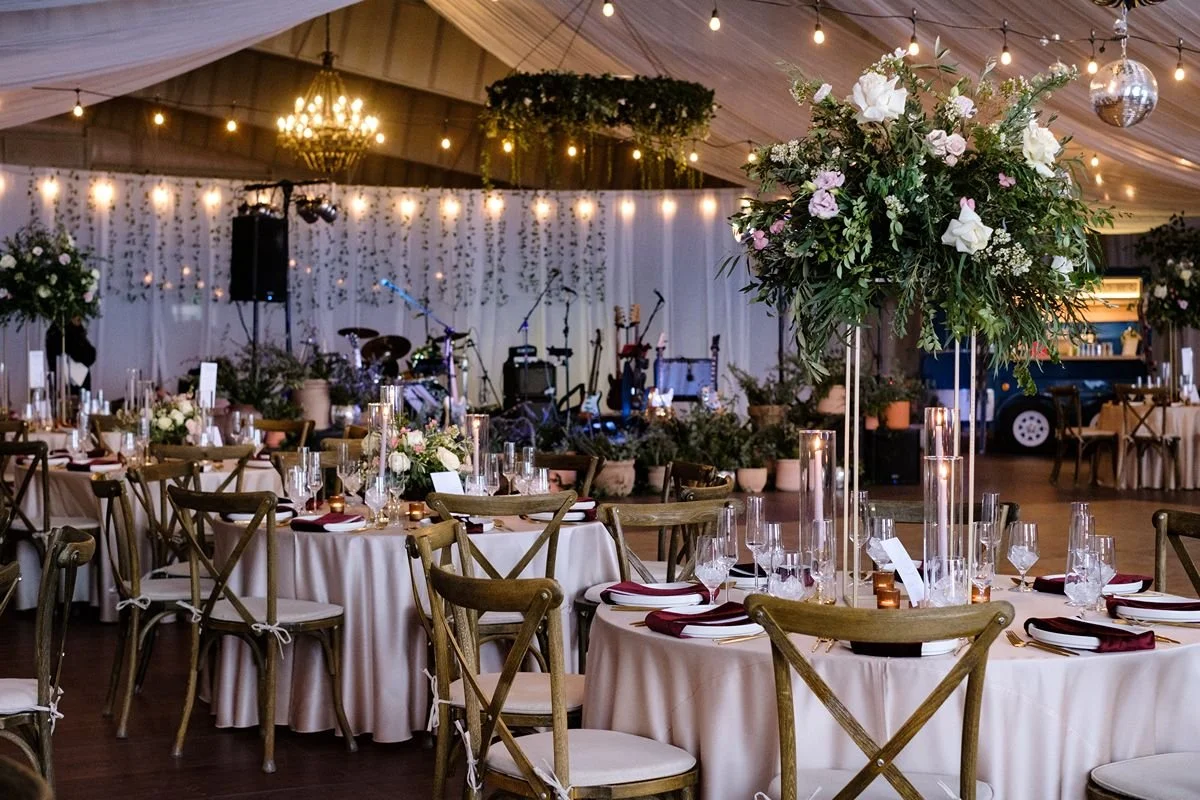 band and stage setup with florals for luxury destination ranch wedding  in winter in Steamboat Springs