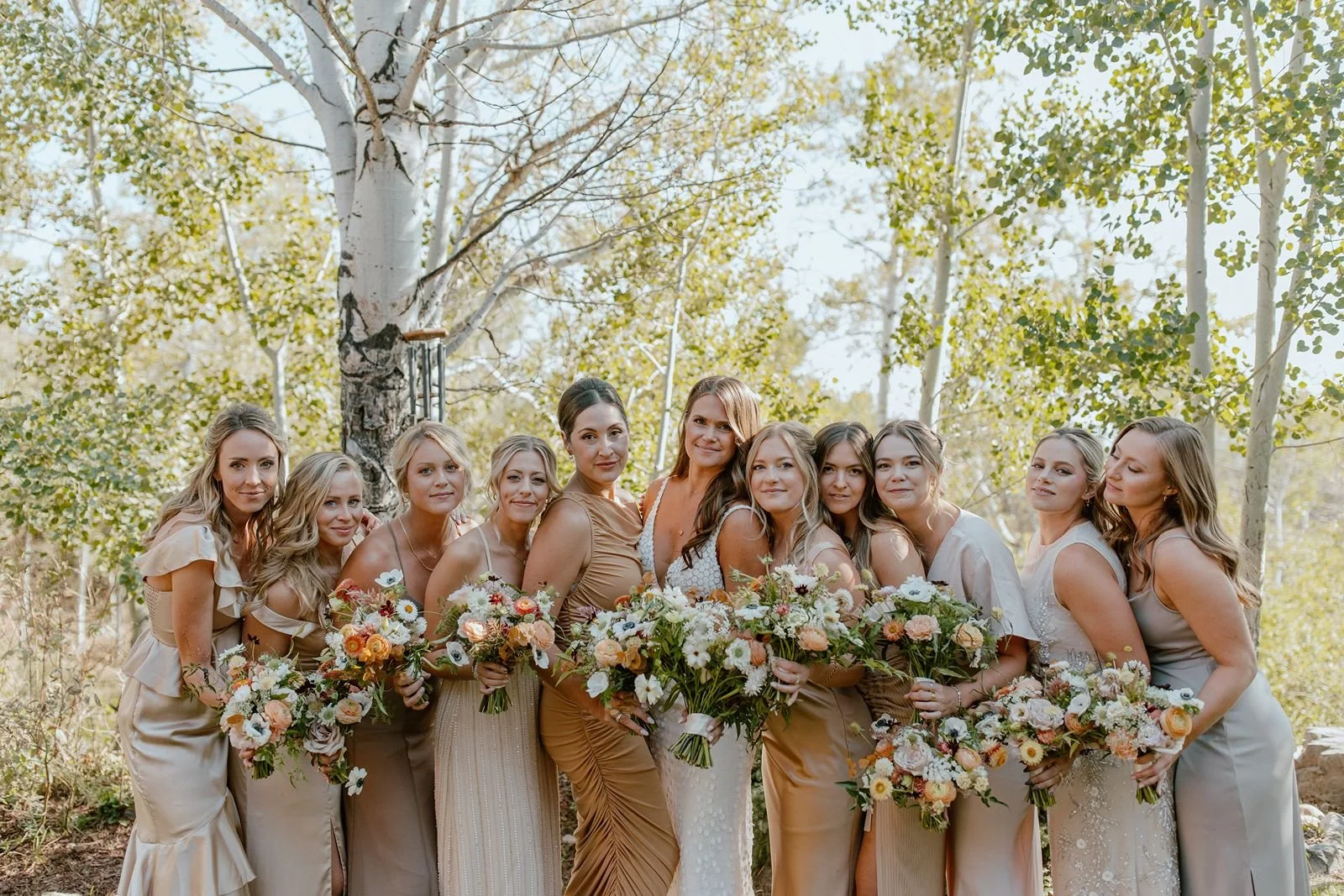 Bridesmaids and bride at fall wedding in Steamboat Springs