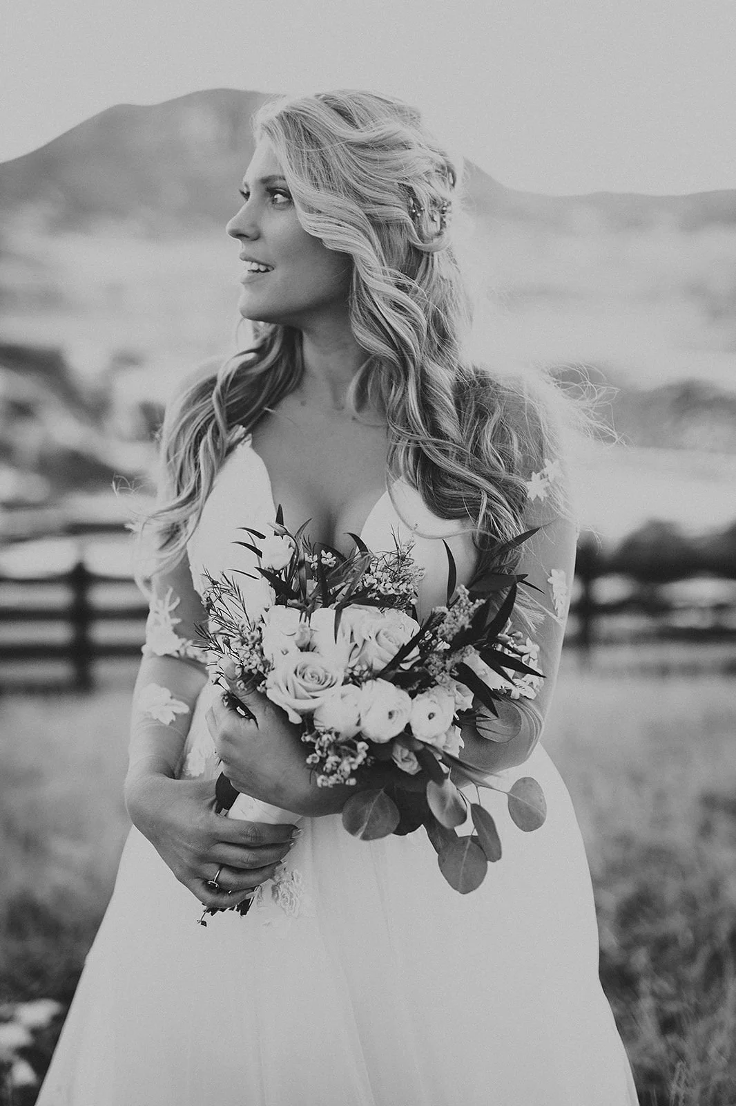 Bride sharing a candid getting-ready moment before her winter ranch wedding in Steamboat Springs