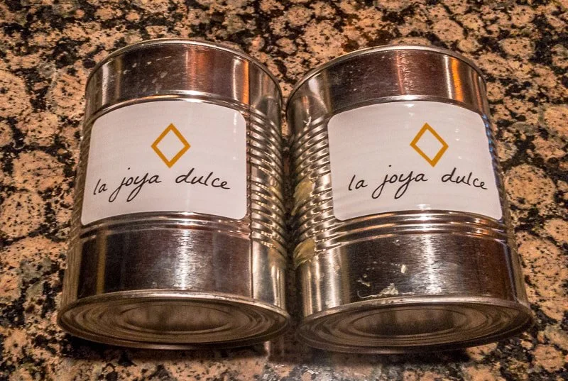Two La Joya Dulce metal washers cans for playing outdoor games at destination wedding venue near Steamboat Springs.