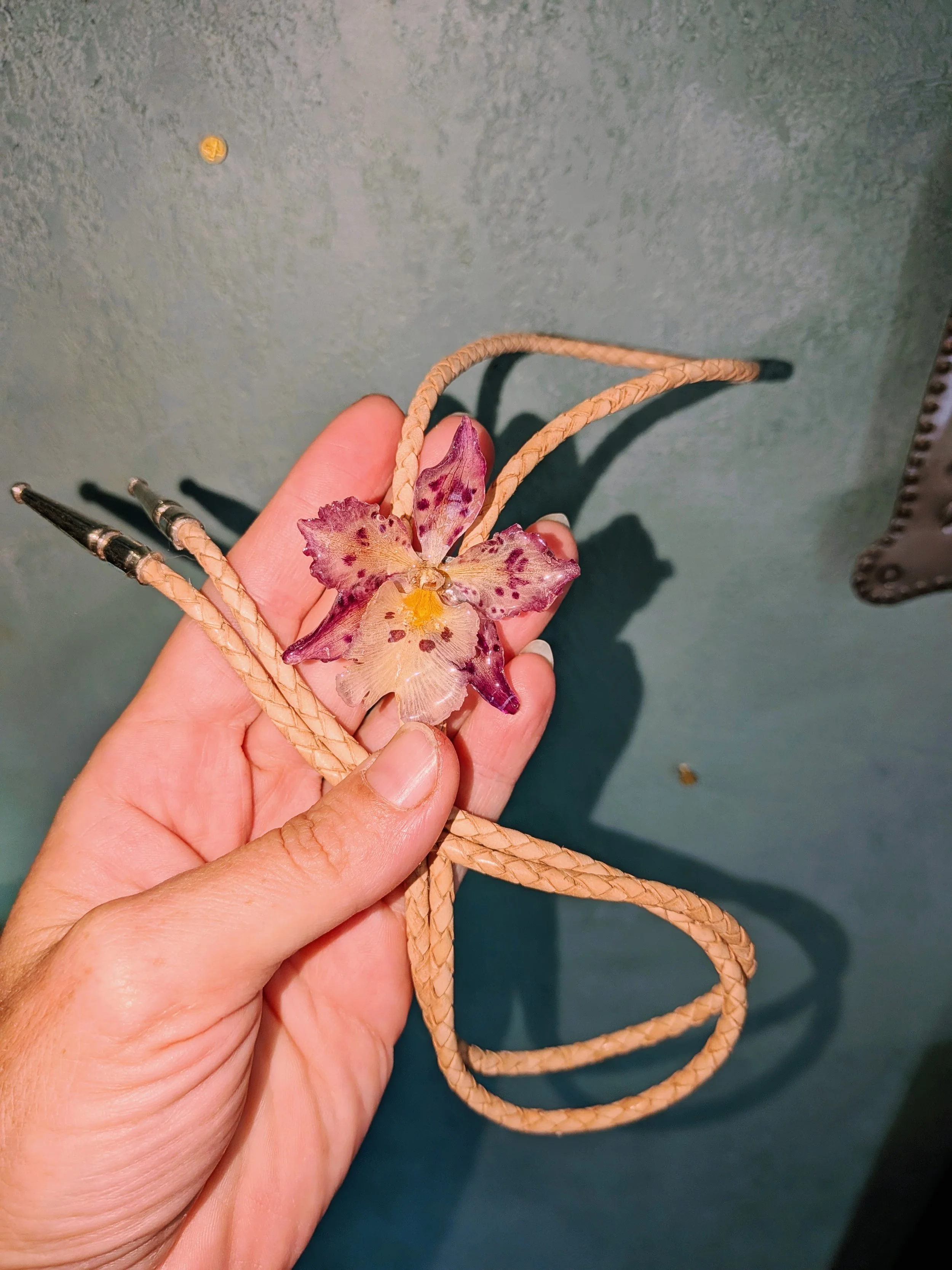 Purple Orchid Bolo Tie with Natural Braided Leather Cord