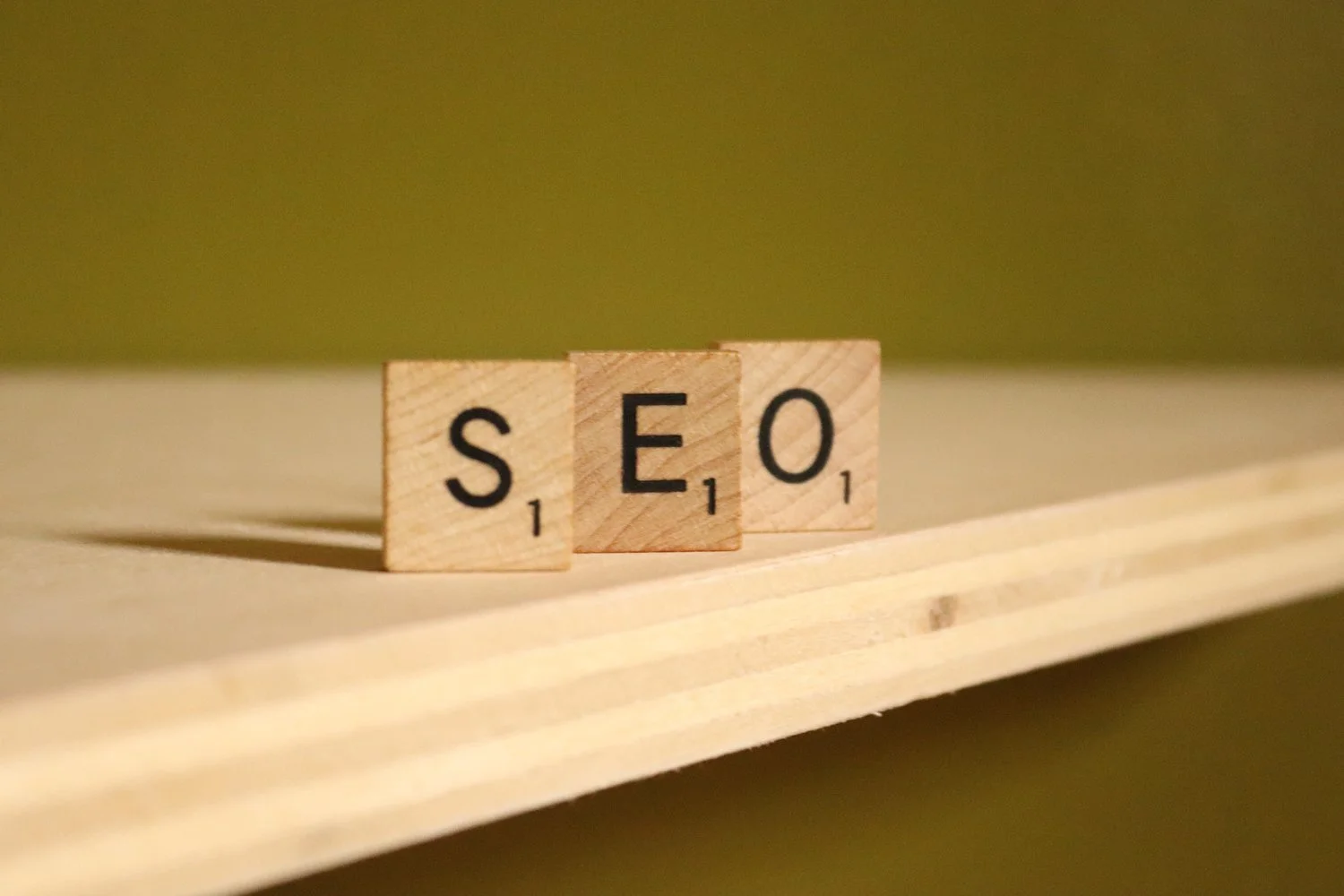 Wooden blocks with SEO on a shelf