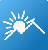 Sunset over mountains with rays