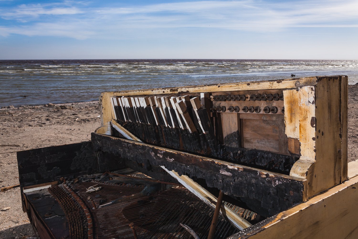 The over saturated salt waters of the Salton Sea make quick work of a piano left on its crusty shoreline.