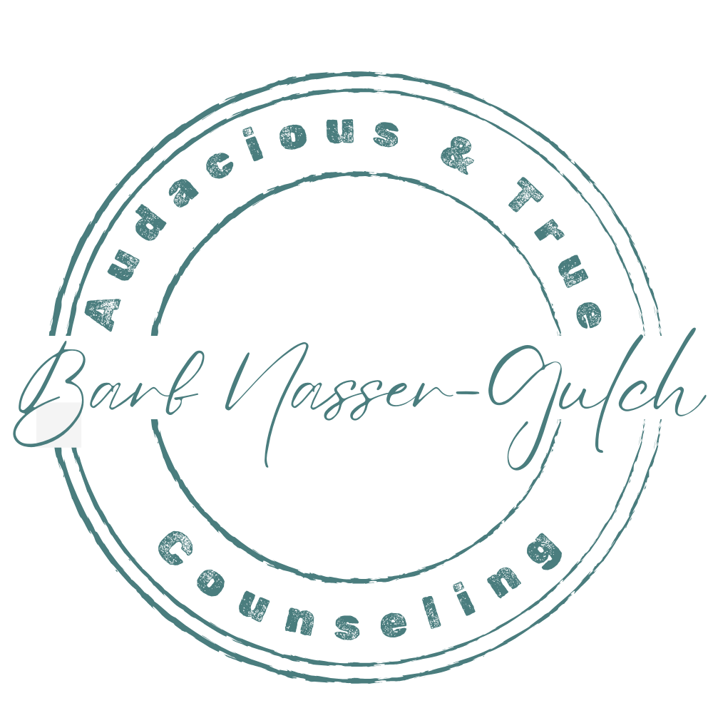 A teal color hand-stamped-style circular logo with the text "Audacious & True Counseling" around the perimeter in all caps and "Barb Nasser-Gulch" in the center in cursive-style font