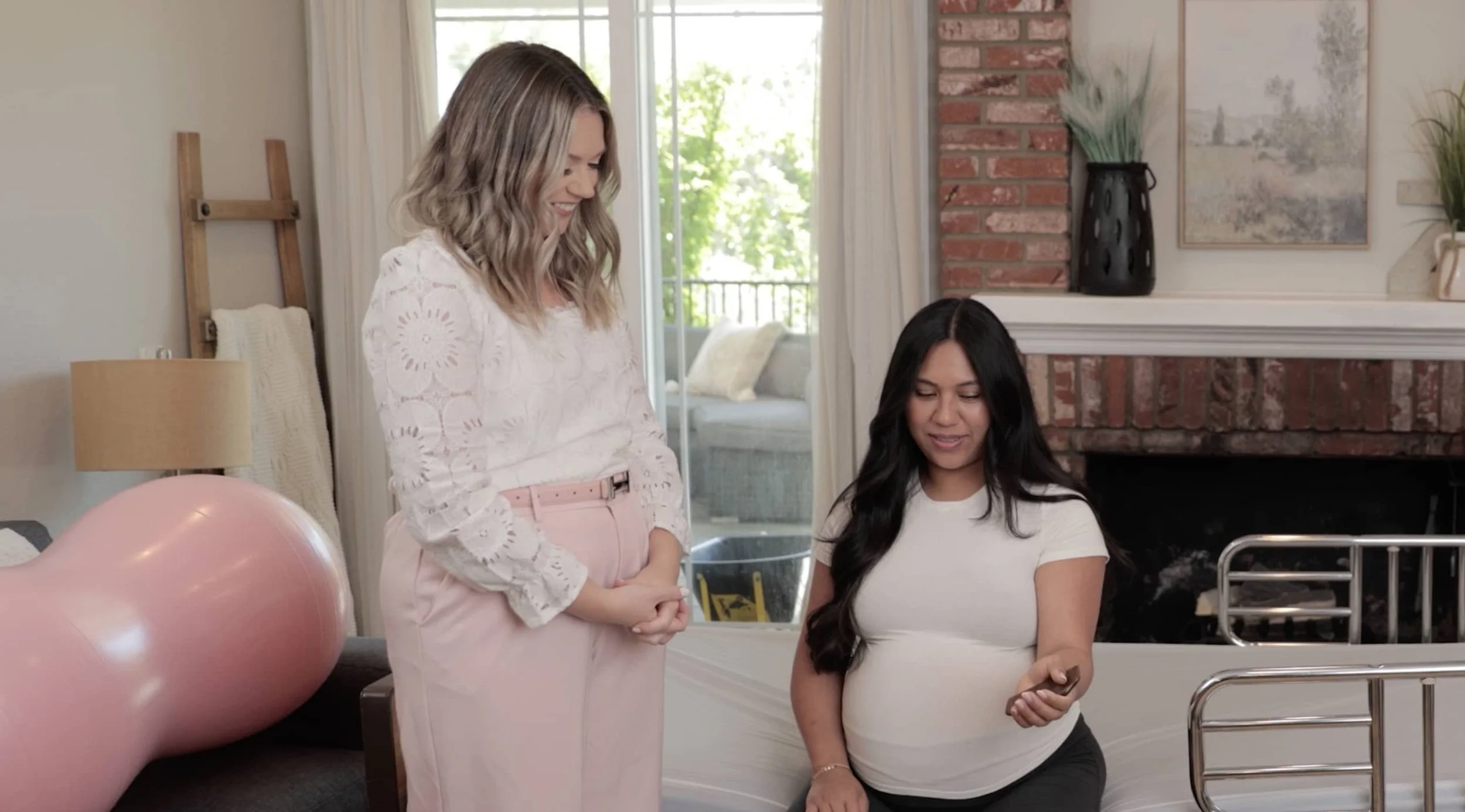 At an in-person childbirth education class in San Diego, a birth doula answers an expecting mother's question.