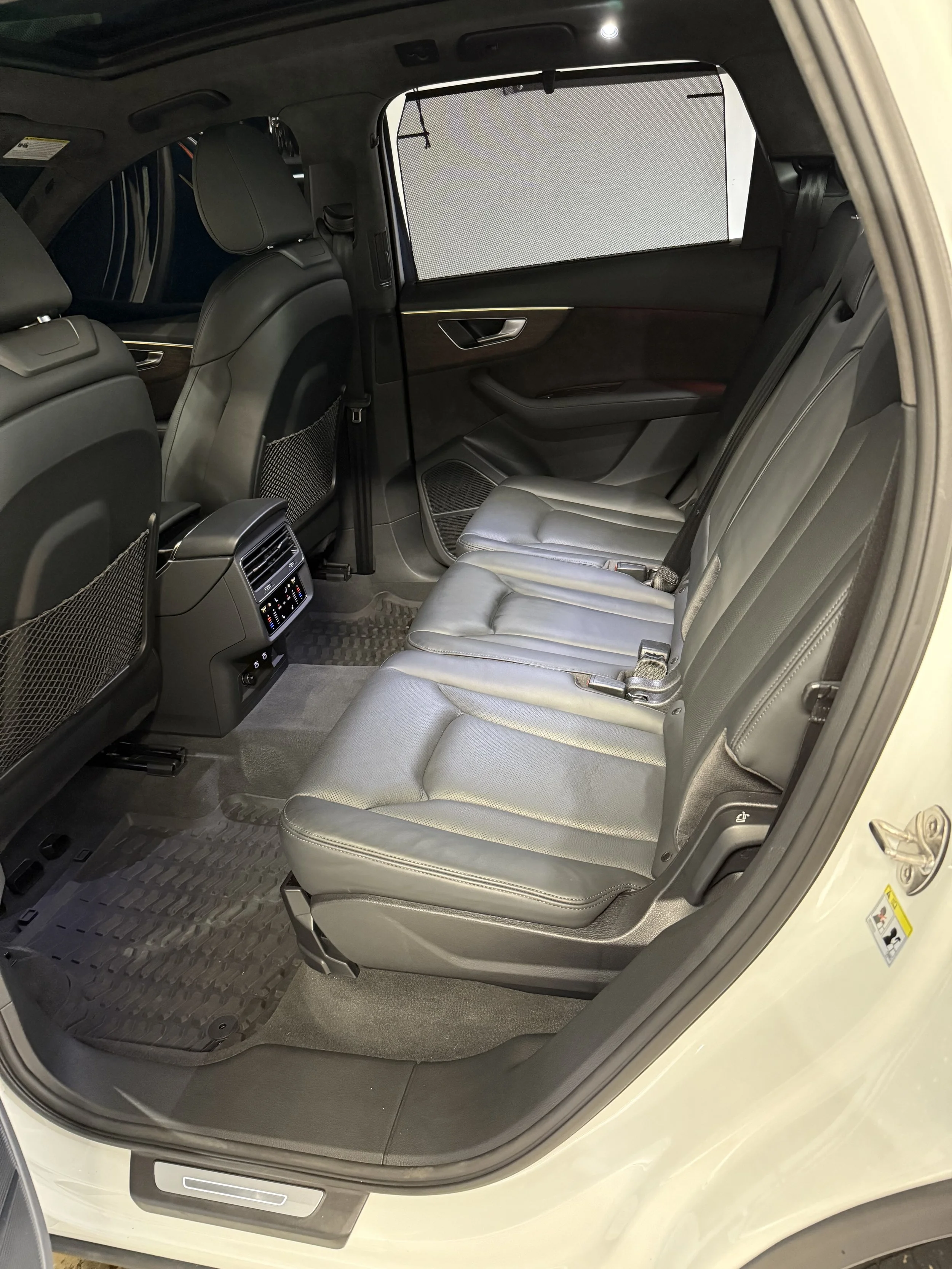 rear bench seat reclines and slides forward in three individual sections with 3 sets of latch anchors