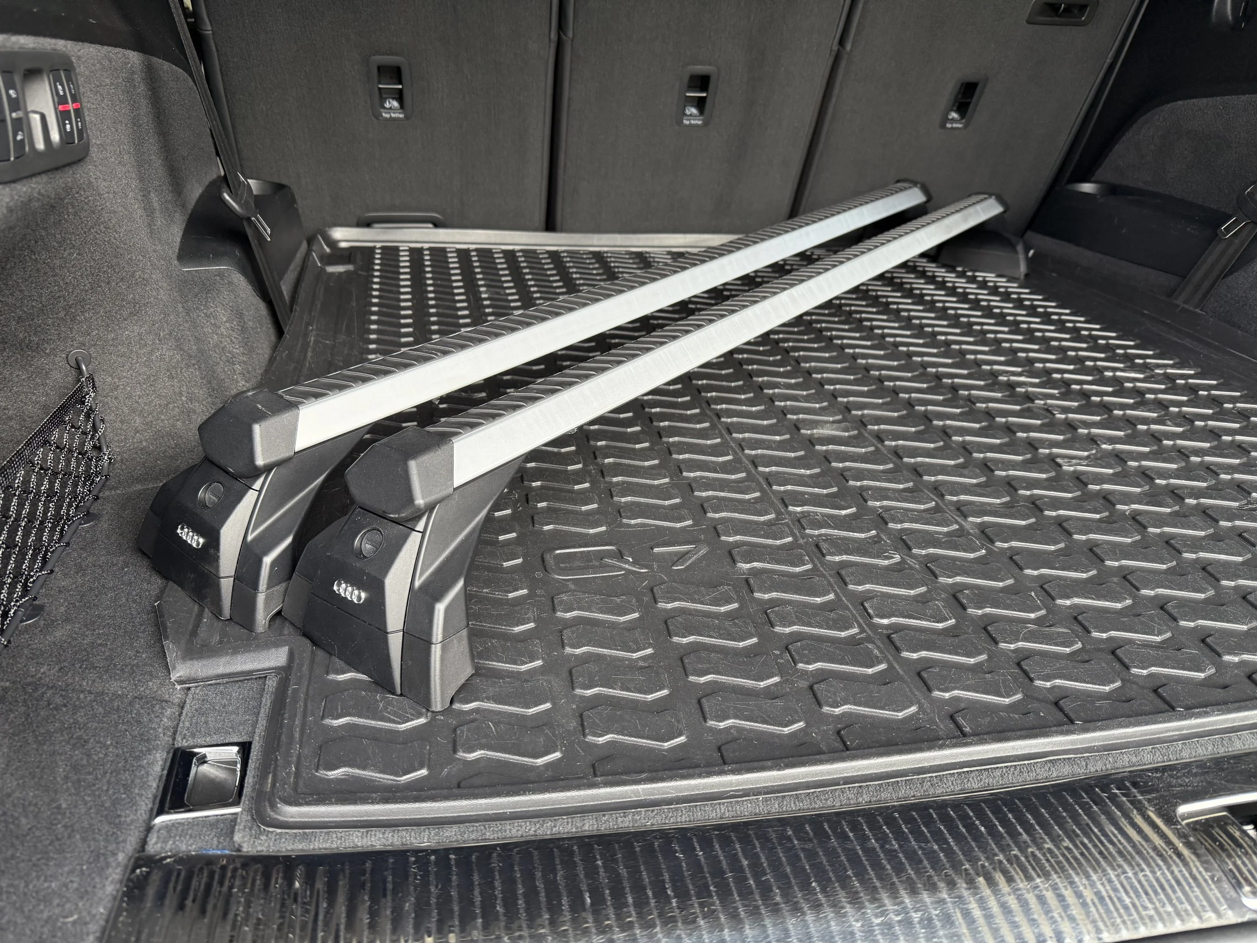 cargo bars and rear trunk mat included