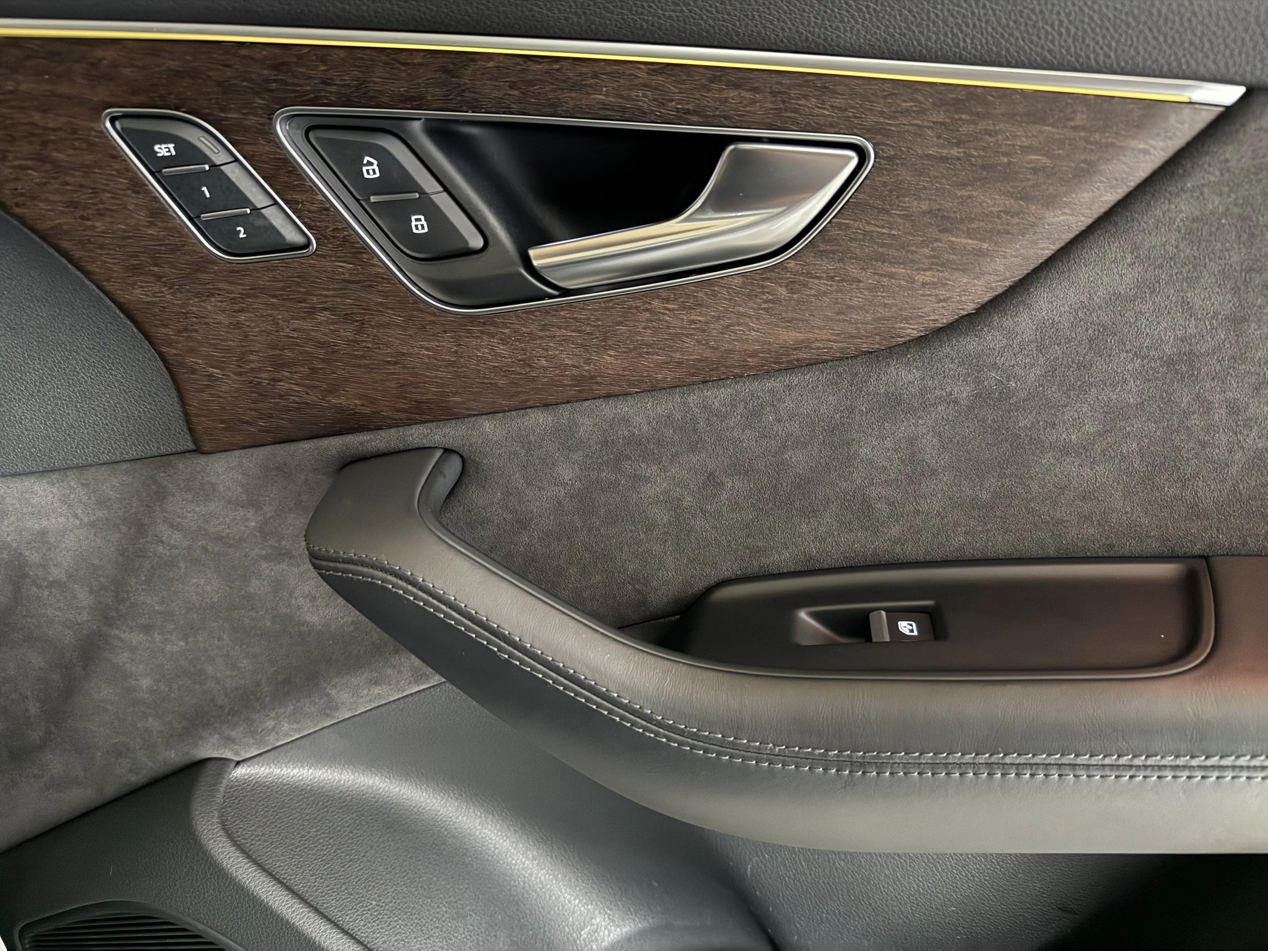 passenger memory settings - stitched leather padded armrests, alcantara door and headliner trim with eucalyptus wood trim (luxury package upgrades)
