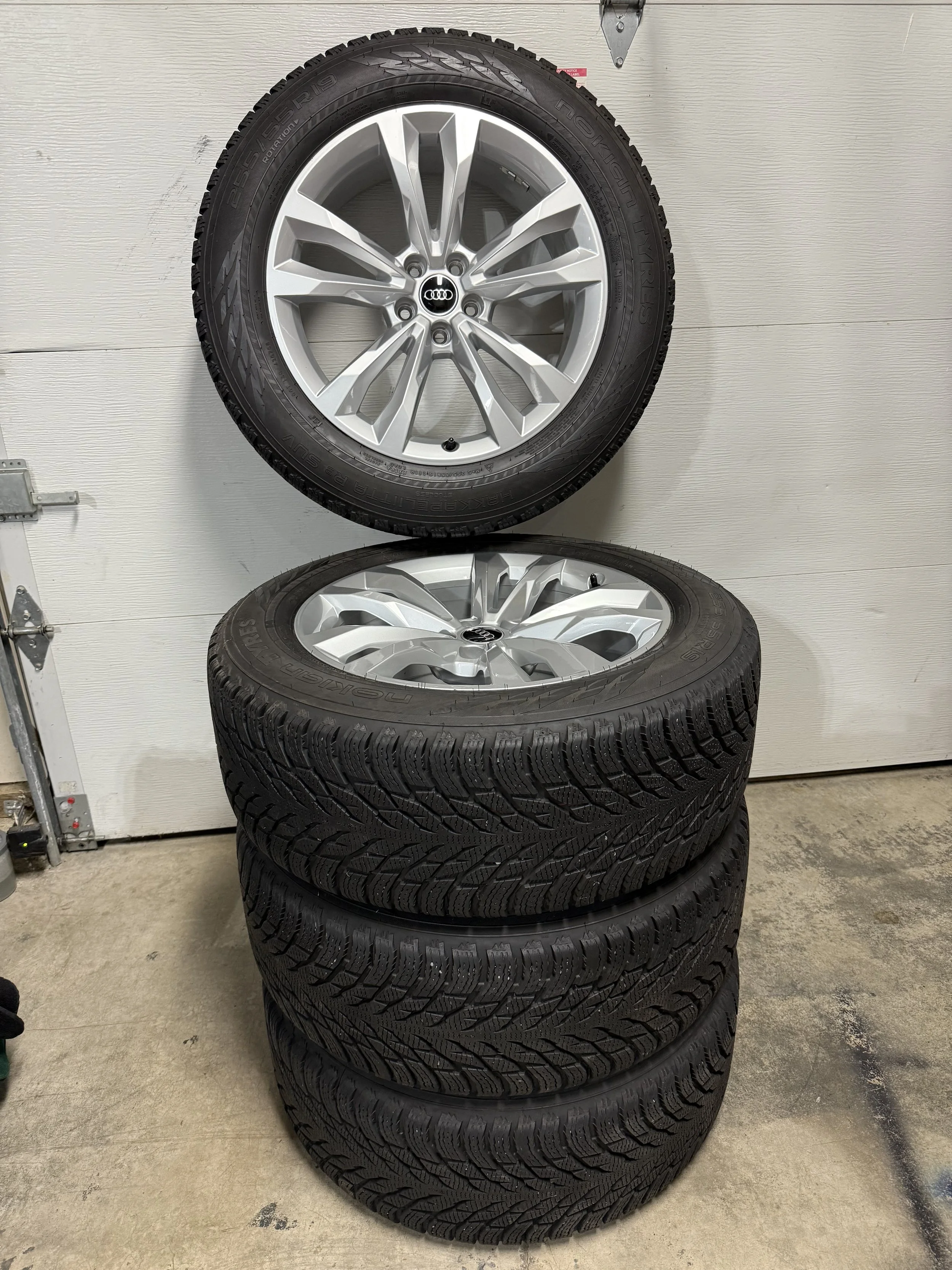 4 Nokian snow tires mounted on Q7 wheels - easy to swap for winter months - 80% tread remaining - included in sale