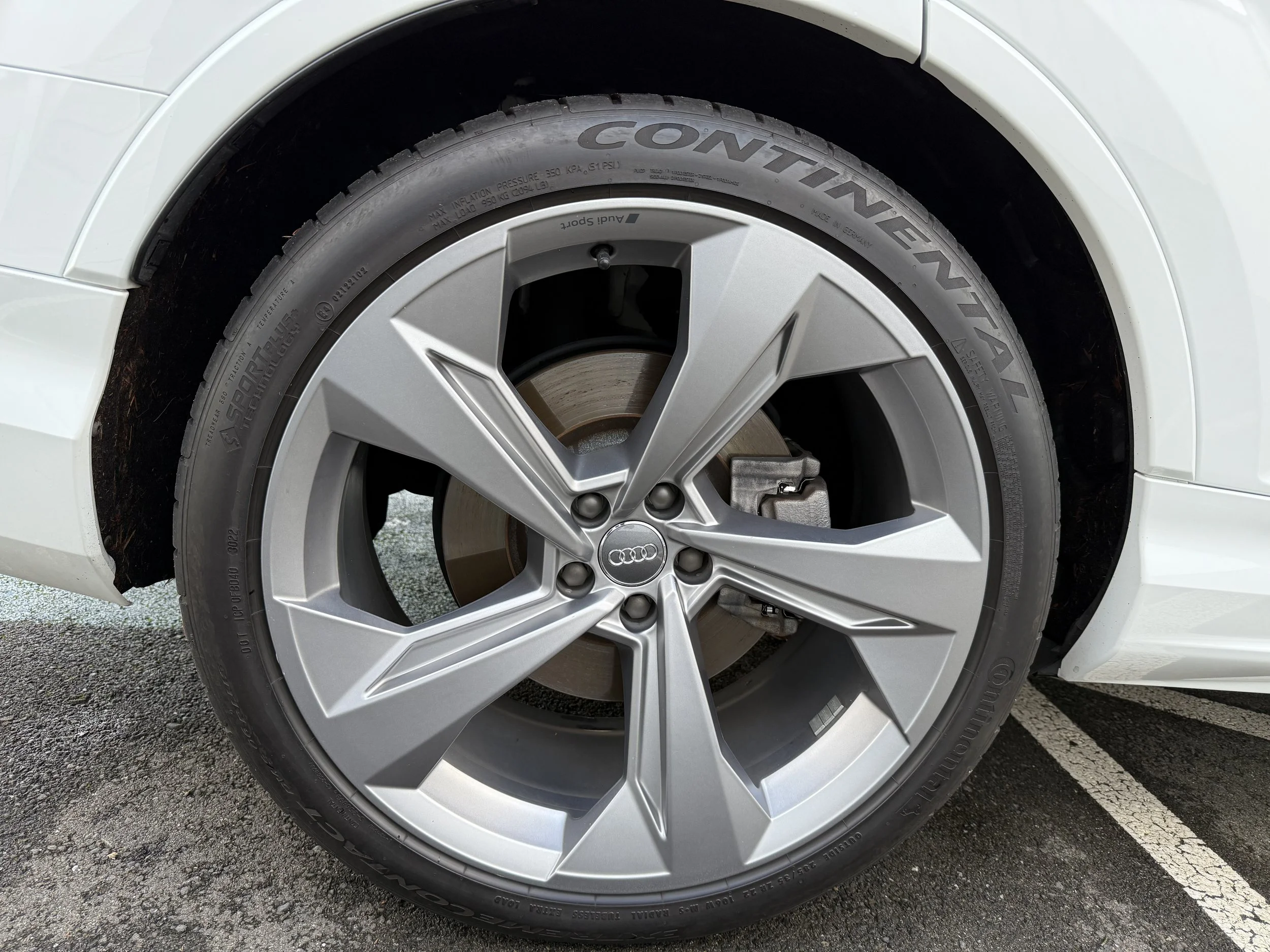 22" upgraded wheels with all-season Continental tires - 70% tread - passenger rear
