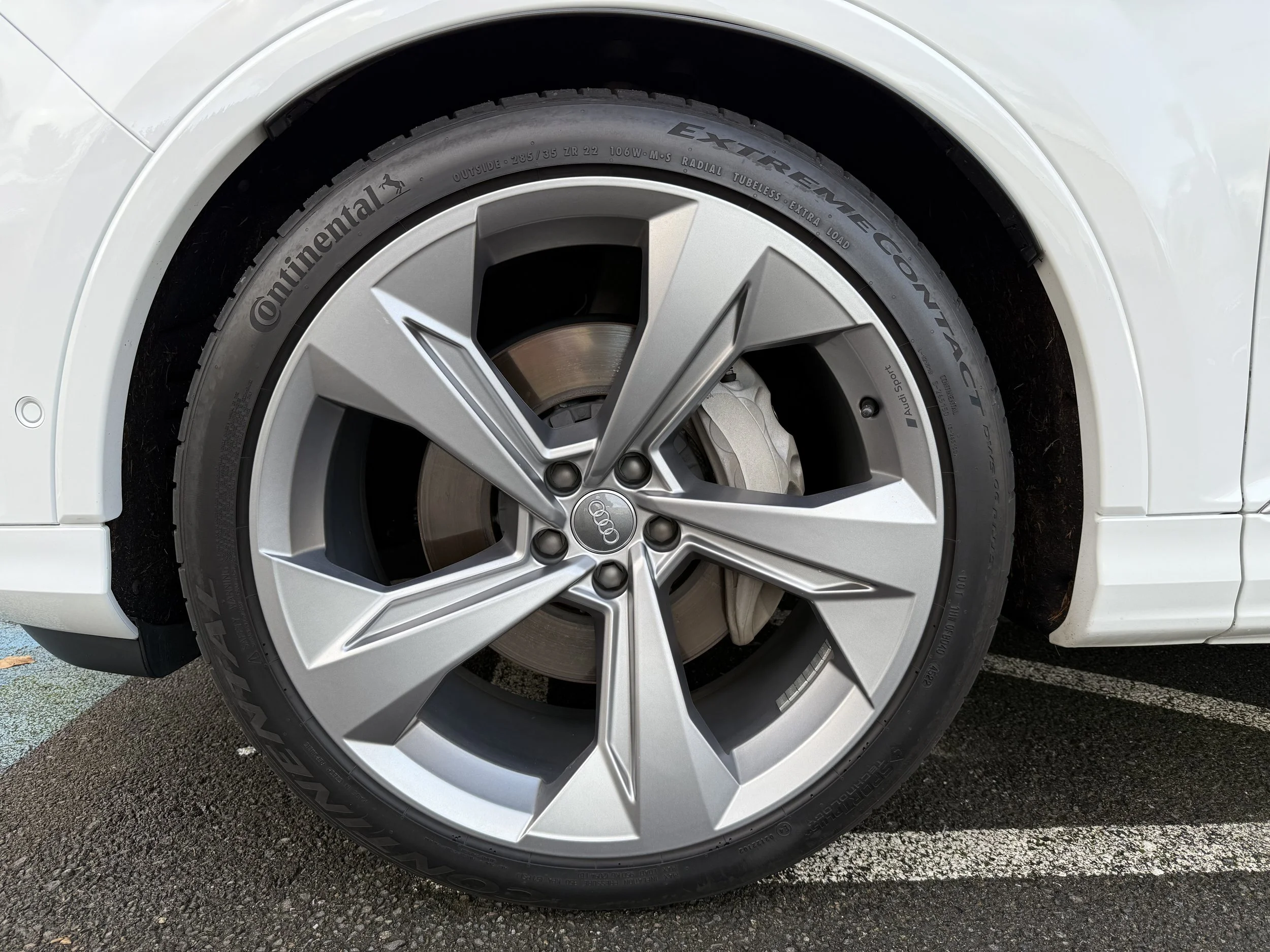 22" upgraded wheels with all-season Continental tires - 70% tread - driver front