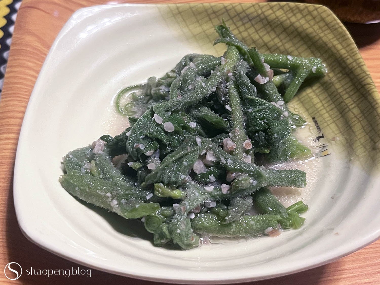 Stir-fried pumpkin shoots.