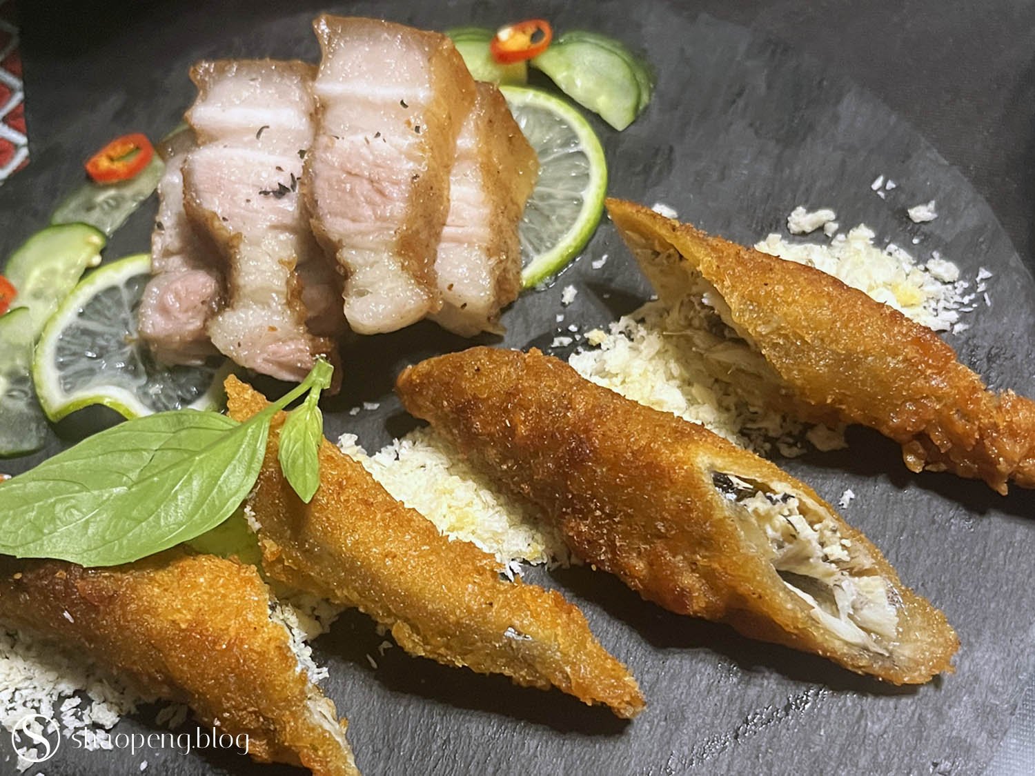 Grilled pork belly and crispy capelin.