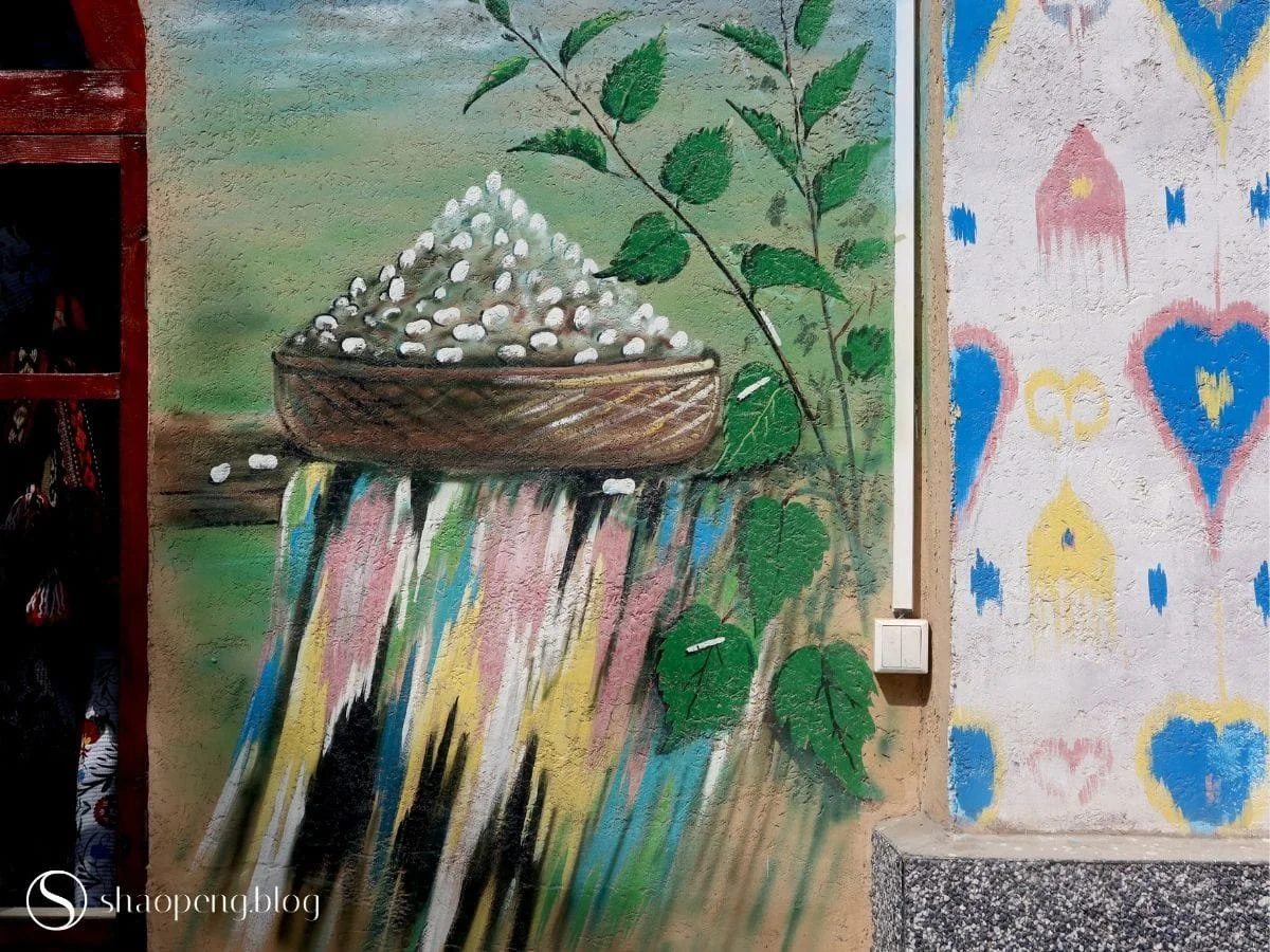Mural painting of cocoons at Yodgorlik Silk Factory in Margilan