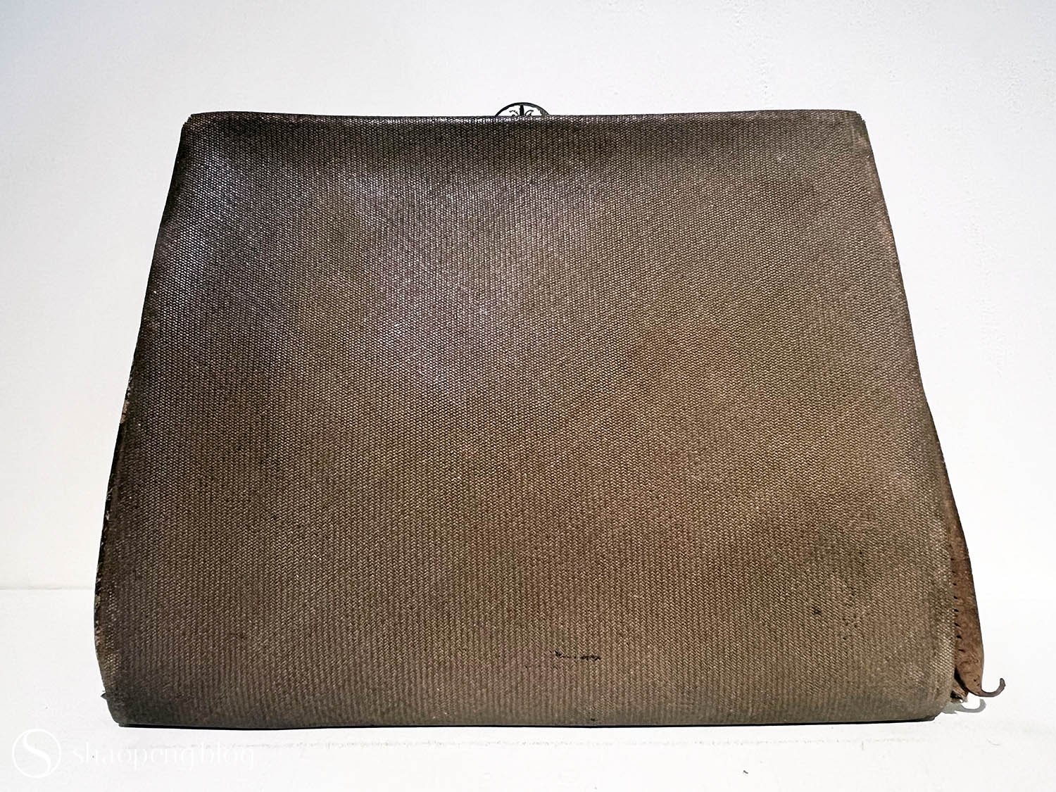 A purse crafted from tiny pieces of tatami mat.