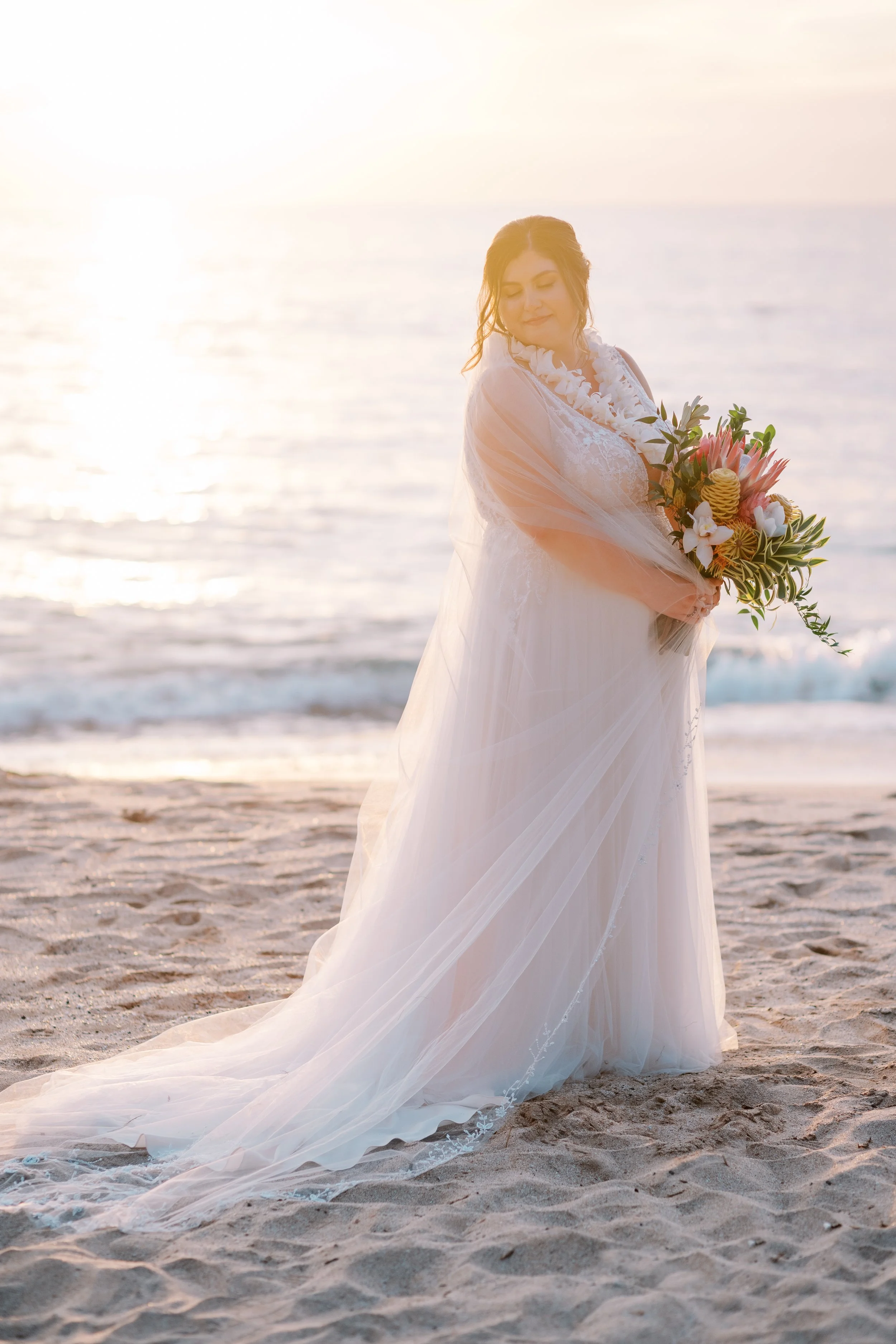 A glowing bride during sunset on a Maui beach photographed on film in Wailea 