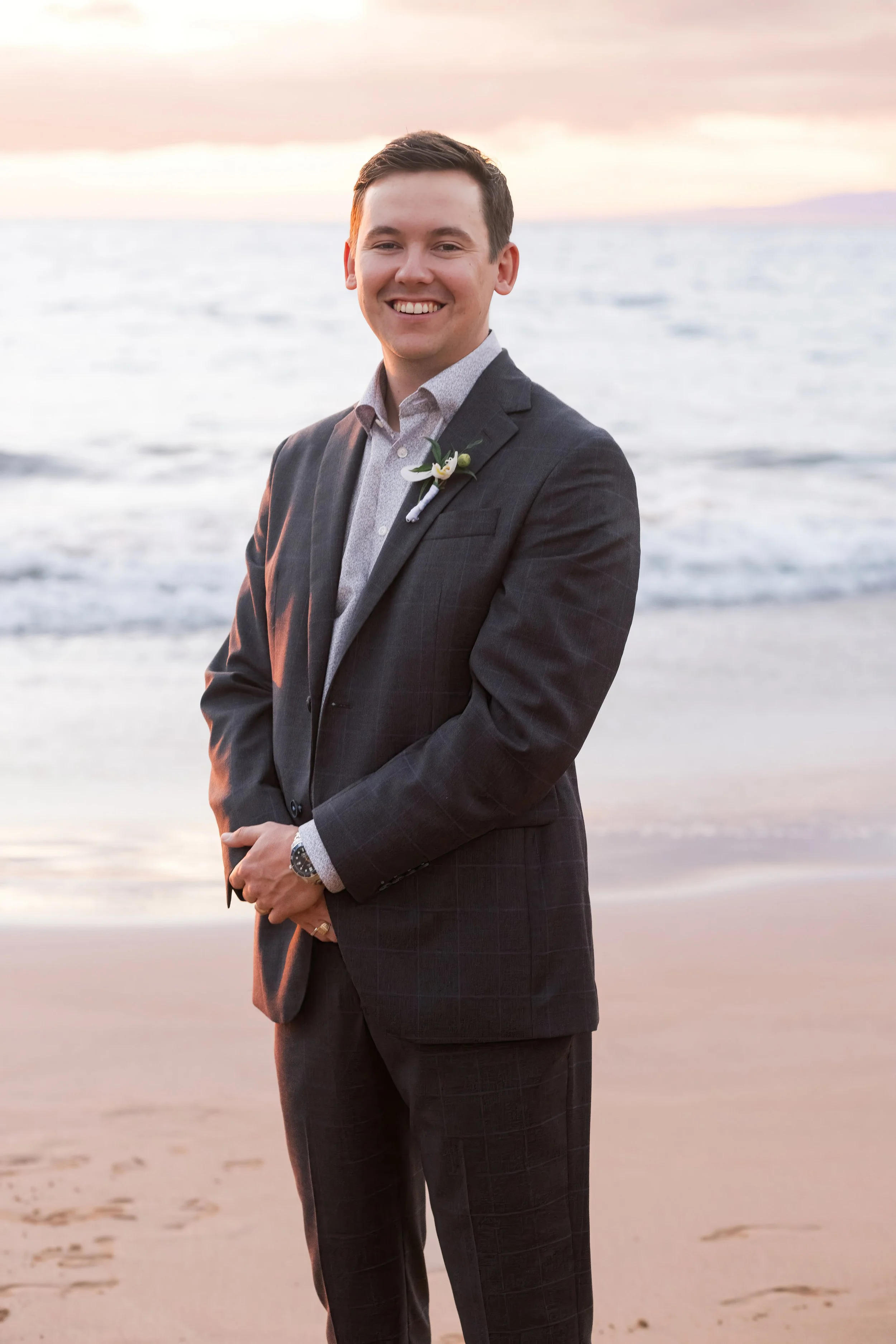 A groom at sunset at Po'olenlena Beach on Maui