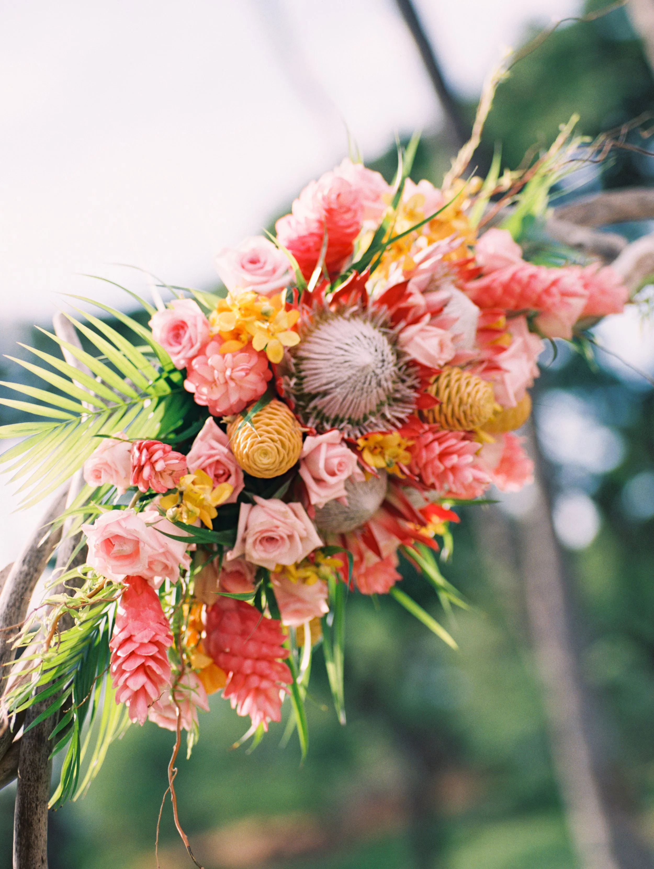 Wedding florals captured on film during a sunset celebration at Gather on Maui.