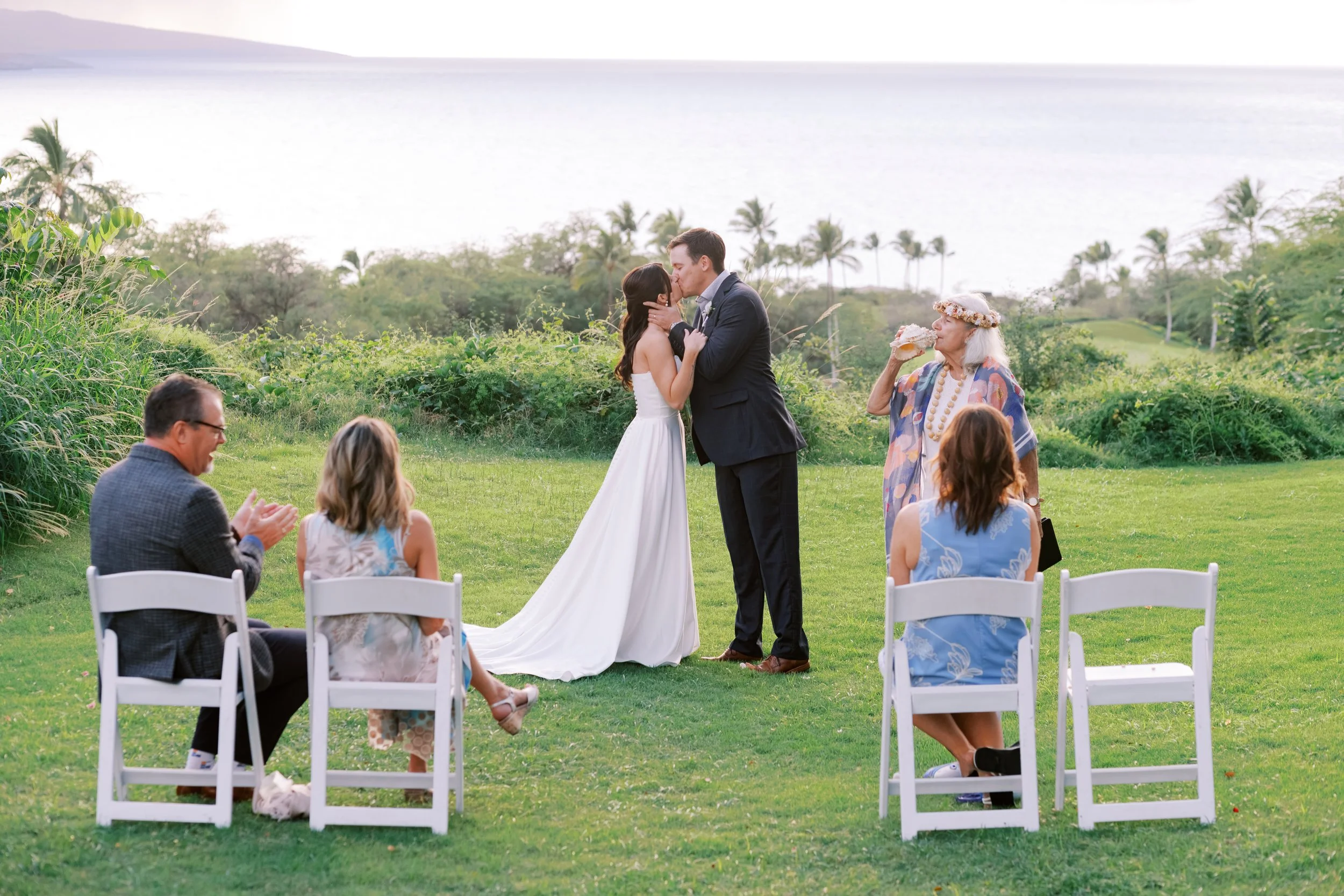 The first kiss at an intimate wedding at Gather on Wailea