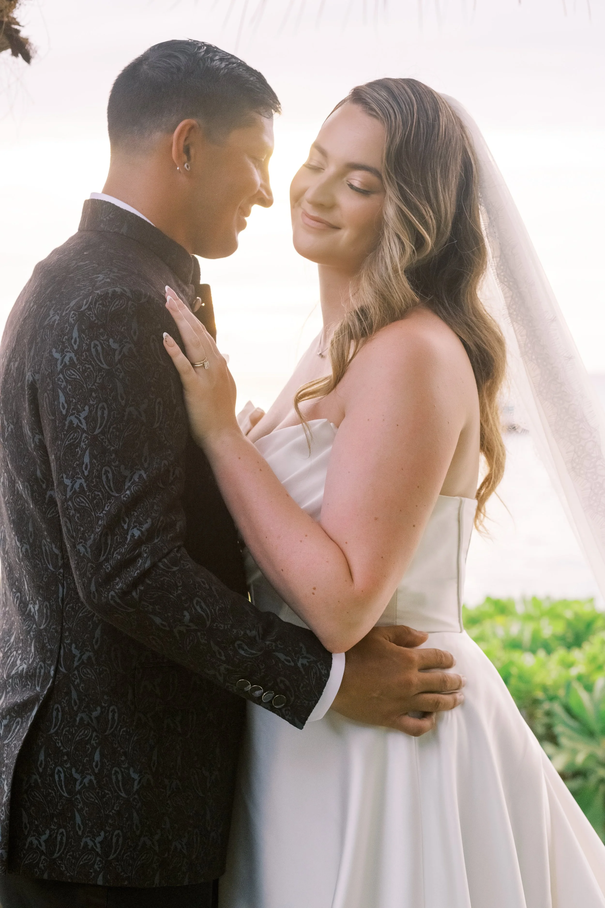 A bride and groom during at their wedding for sunset photos on film at The Royal Lahaina Resort on Maui
