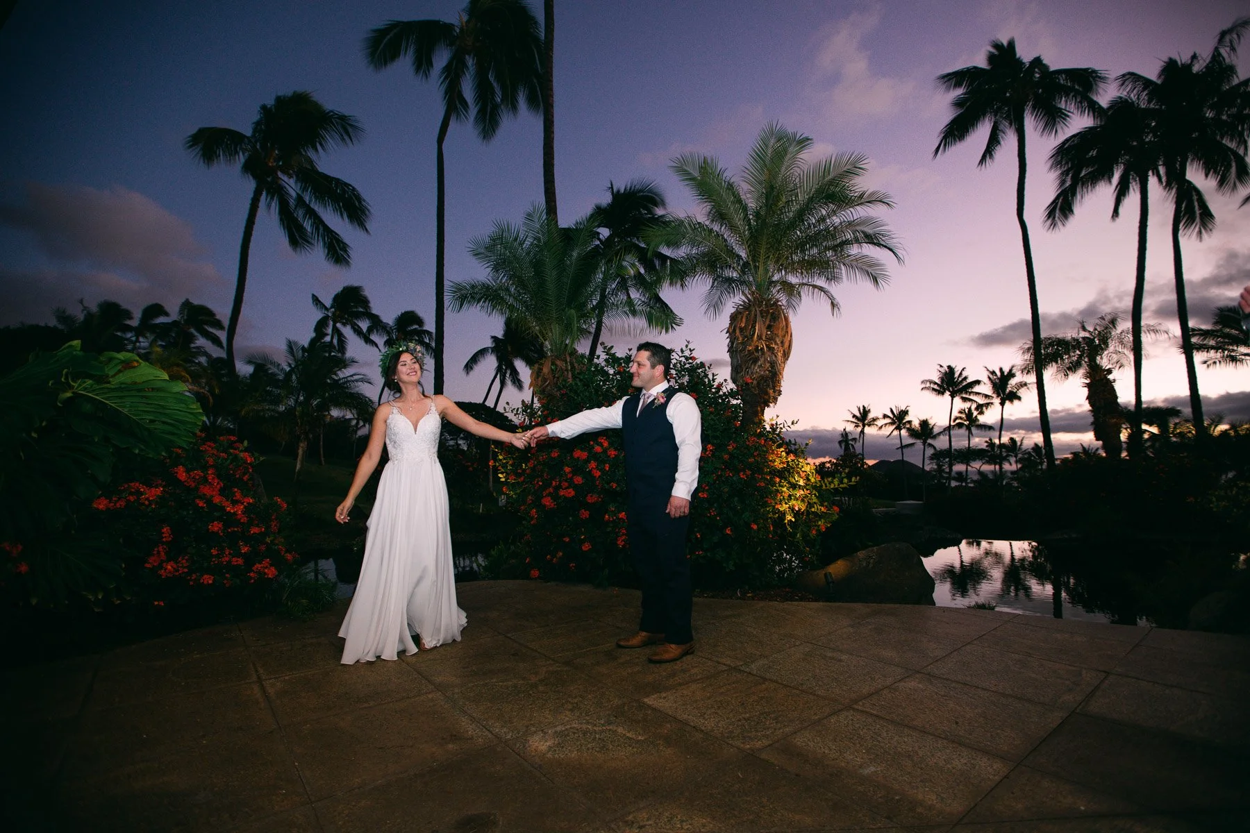 A wedding couple dancing at sunset during their wedding at Gather on Maui in Wailea.