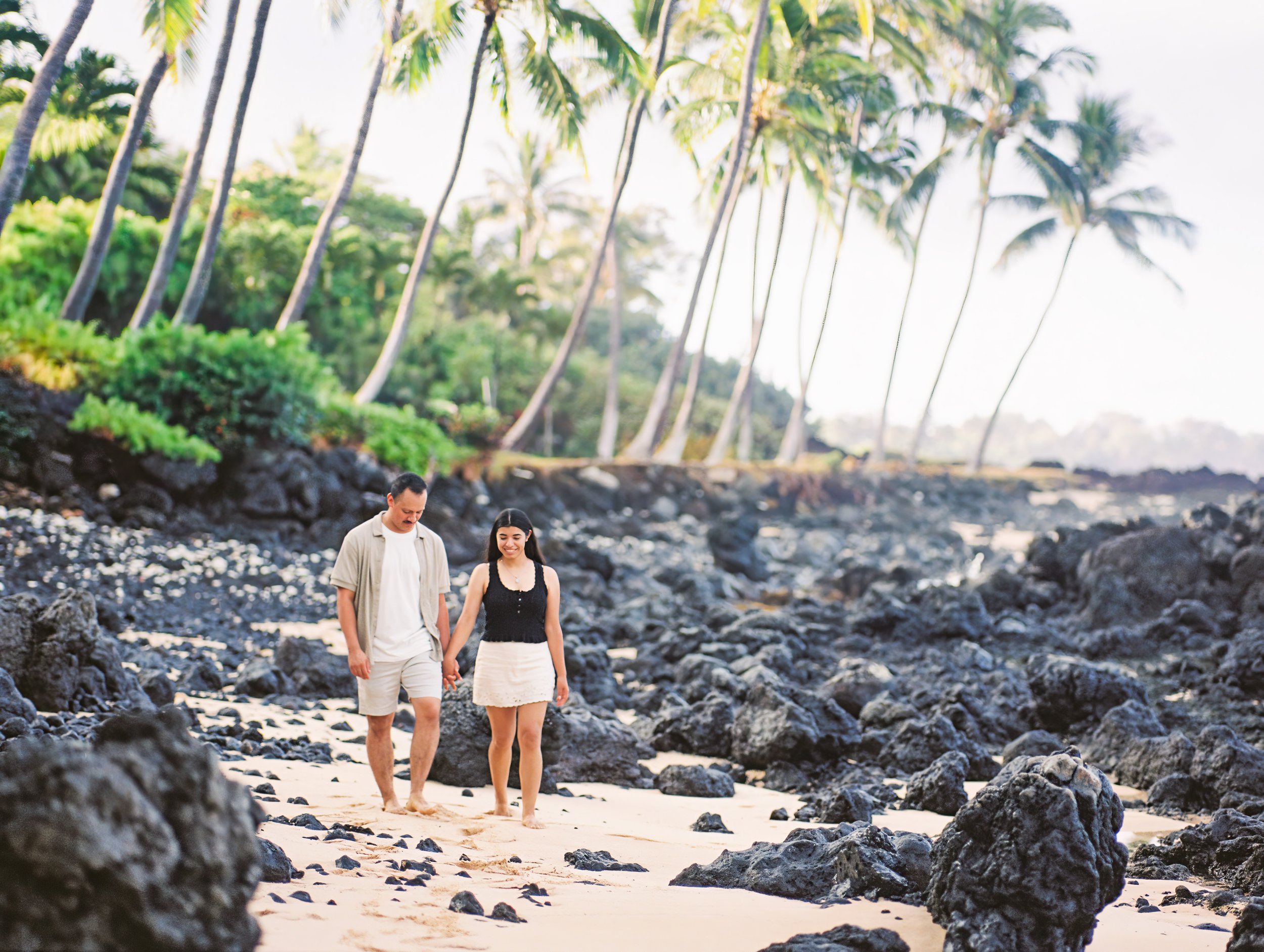 An engagement photoshoot captured using film photography at Makena Cove in Maui Hawaii.