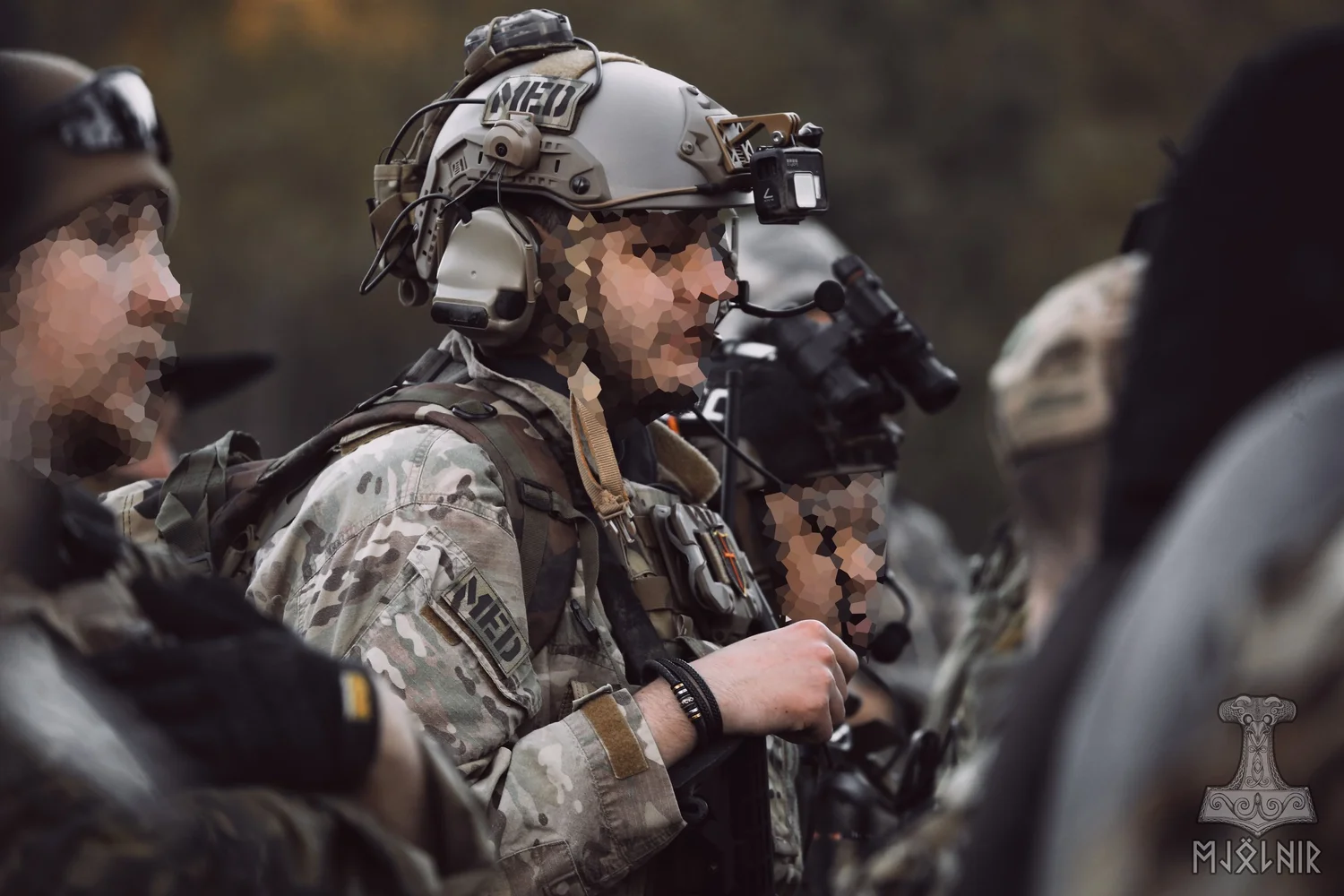 Kitted-up milsim players during a gel ball skirmish at Operation White Tiger 2