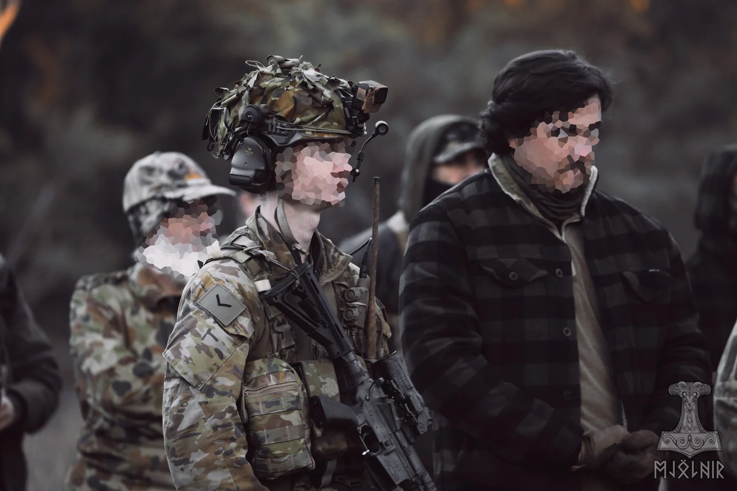 Mjolnir Gelsim players advancing during a milsim event at Buccas Outpost