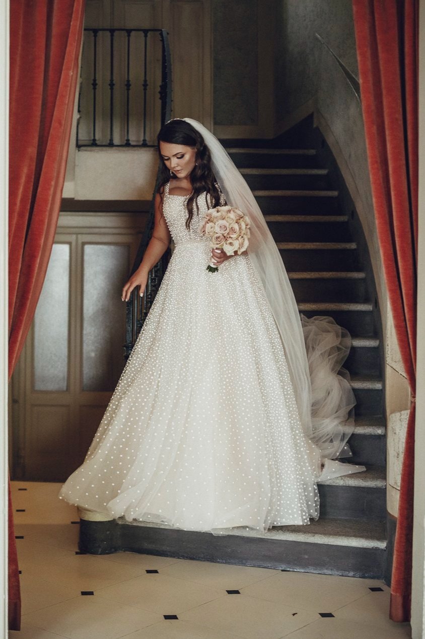 bride walking down stairs italy wedding