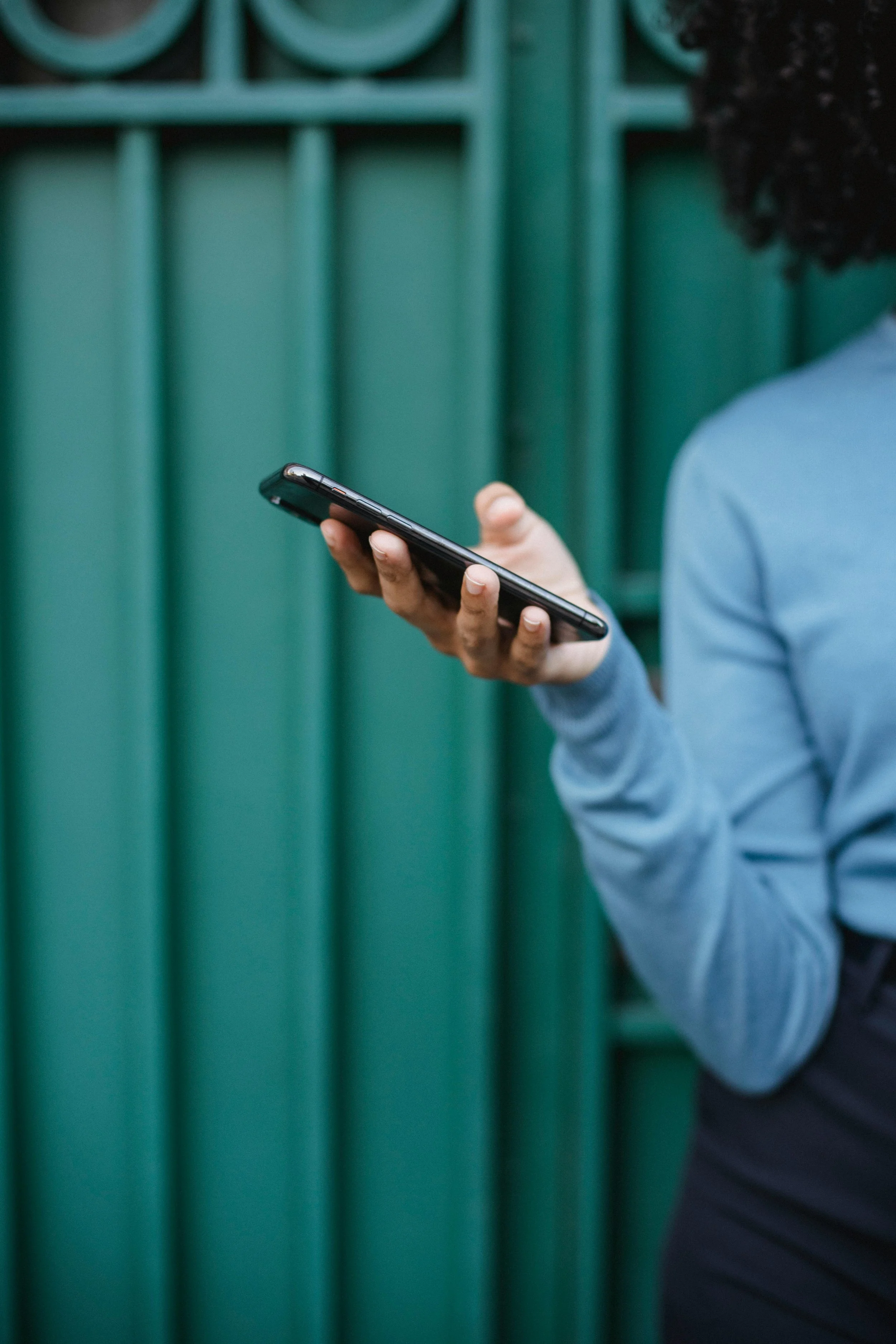 Woman holding cell phone