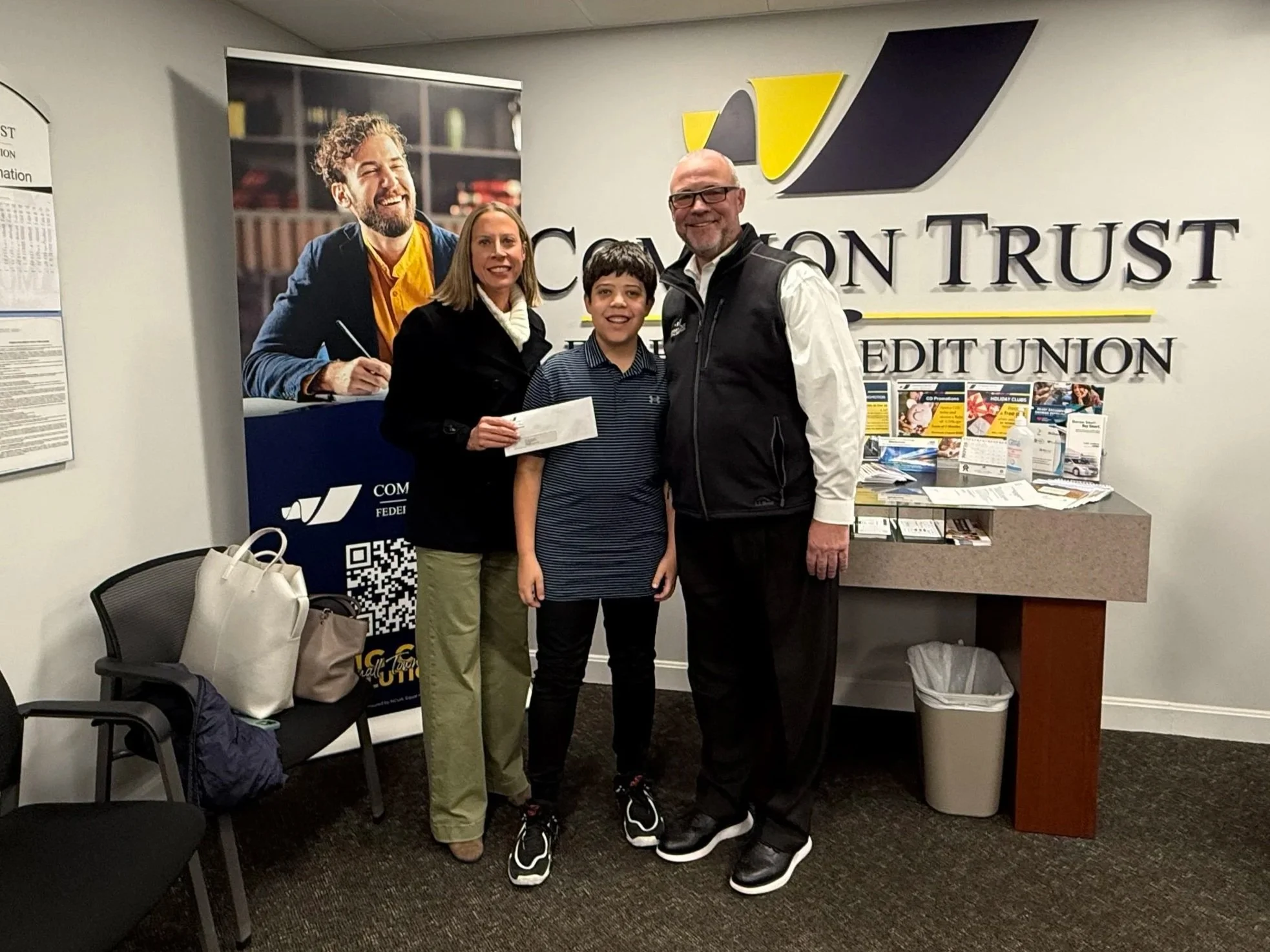 Check Presentation with Jack , Danielle, and Jim McCorkle