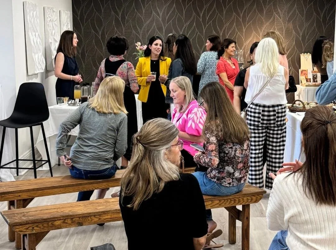 Guests mingling and chatting during Morph Med Spa's Spring Soiree in Ridgefield, Connecticut.