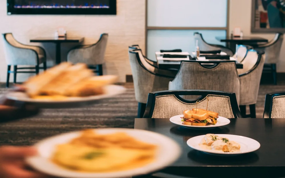 Plates of sandwiches in the Gilmore’s Pub dining room