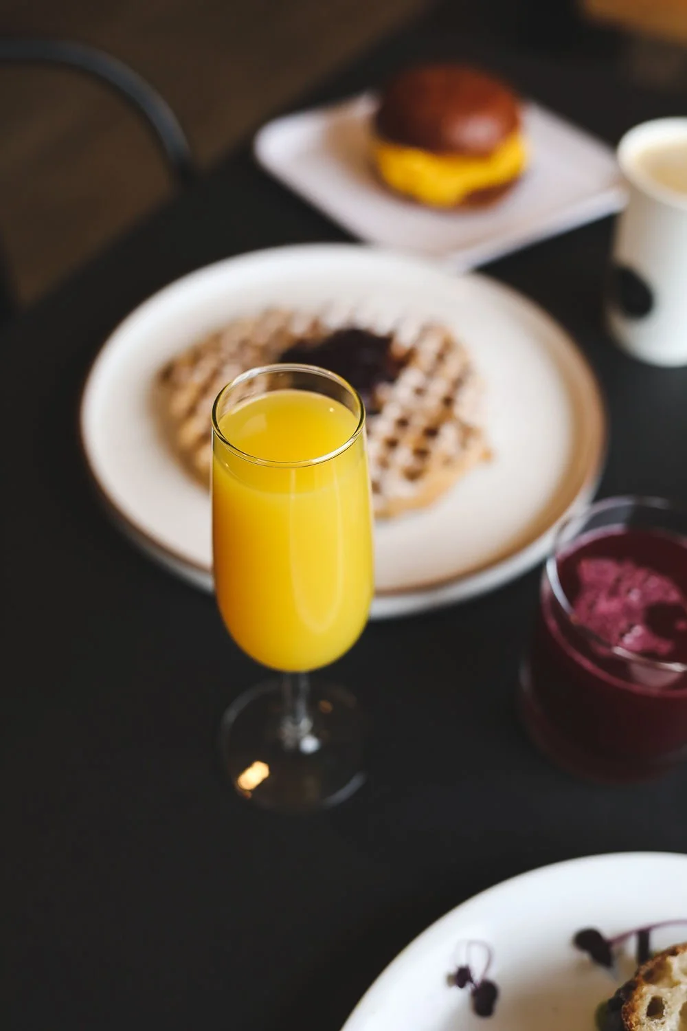Mimosa with a fresh beet juice and a waffle. 