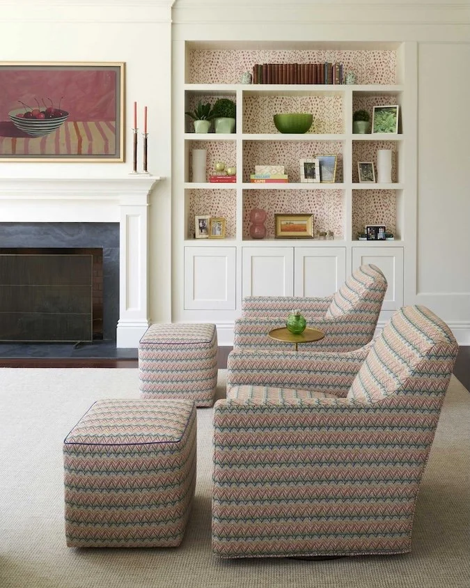 two-upholstered-chairs-with-built-in-book-shelves.jpg