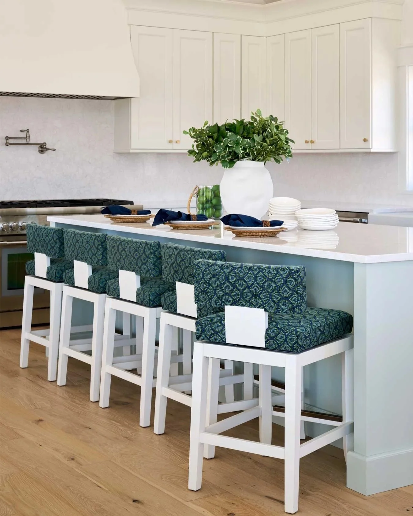 Patterned bar stools in modern kitchen.