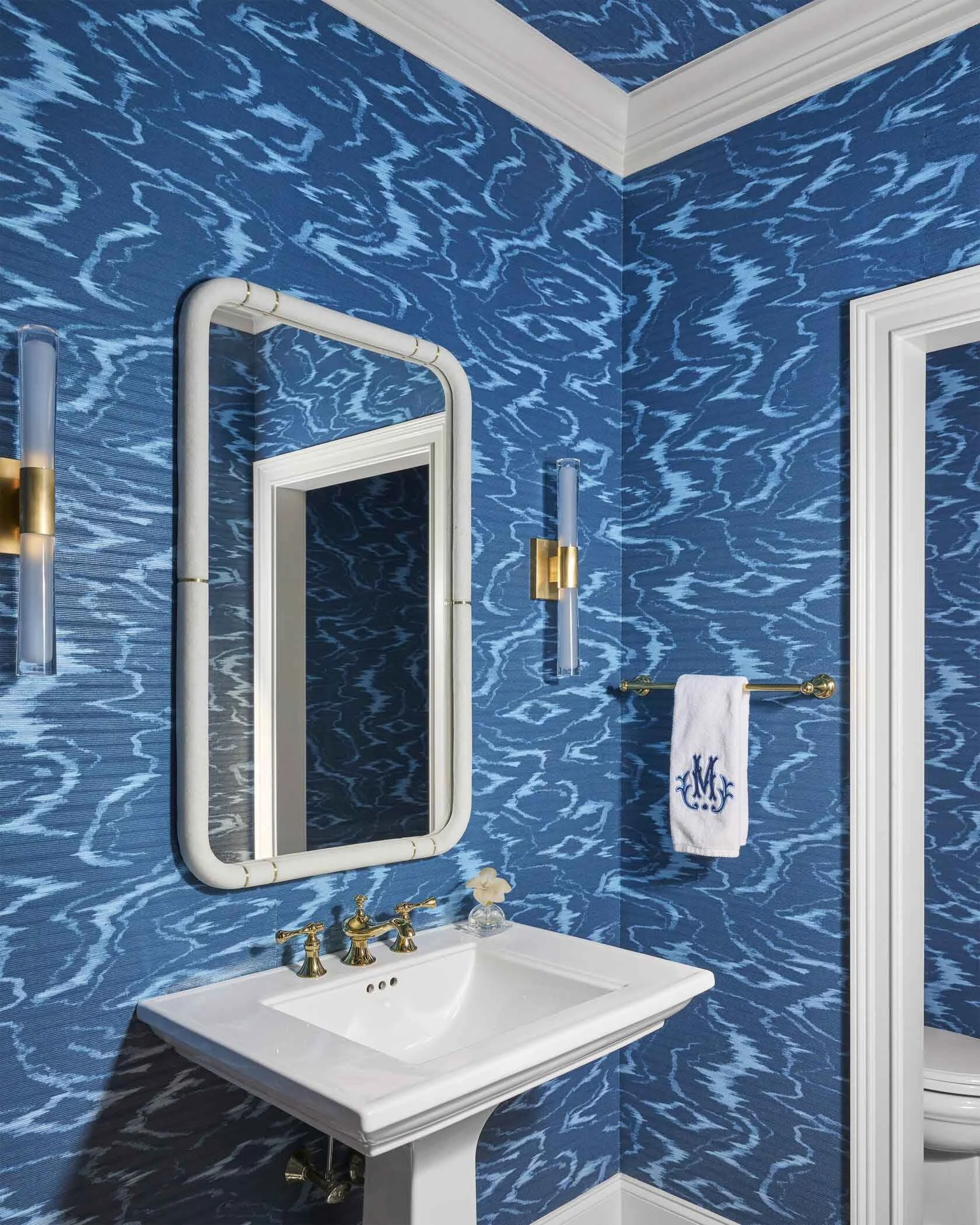 powder-room-with-blue-pattern-wallpaper.jpg