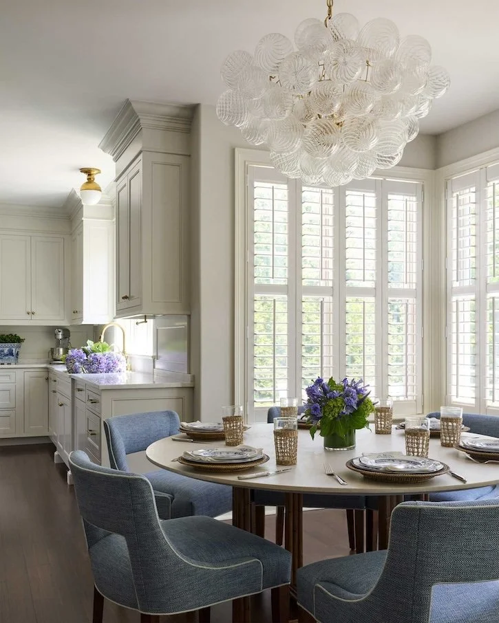 round-dining-table-with-sphere-light-above.jpg