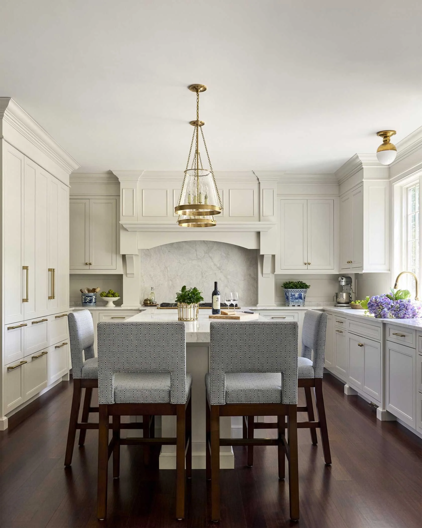 kitchen-bar-with-blue-upholstered-stools.jpg