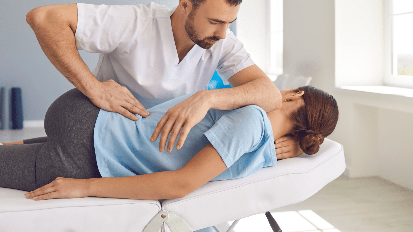 Chiropractor treating a patient after a car accident
