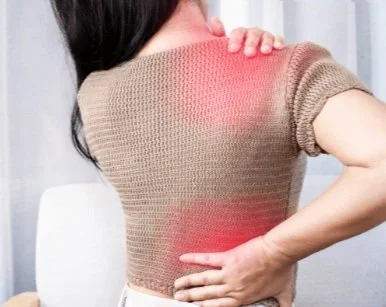 Patient with back and neck pain, the painful areas highlighted in red