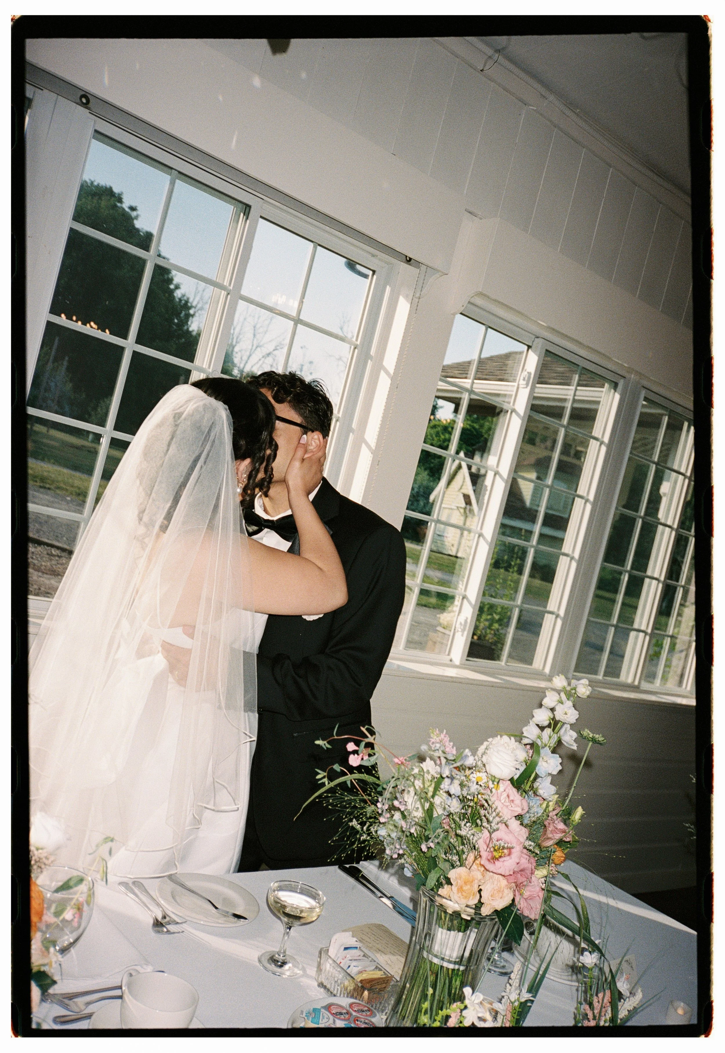 Ottawa wedding film photographer capturing an intimate analog ceremony on 35mm film