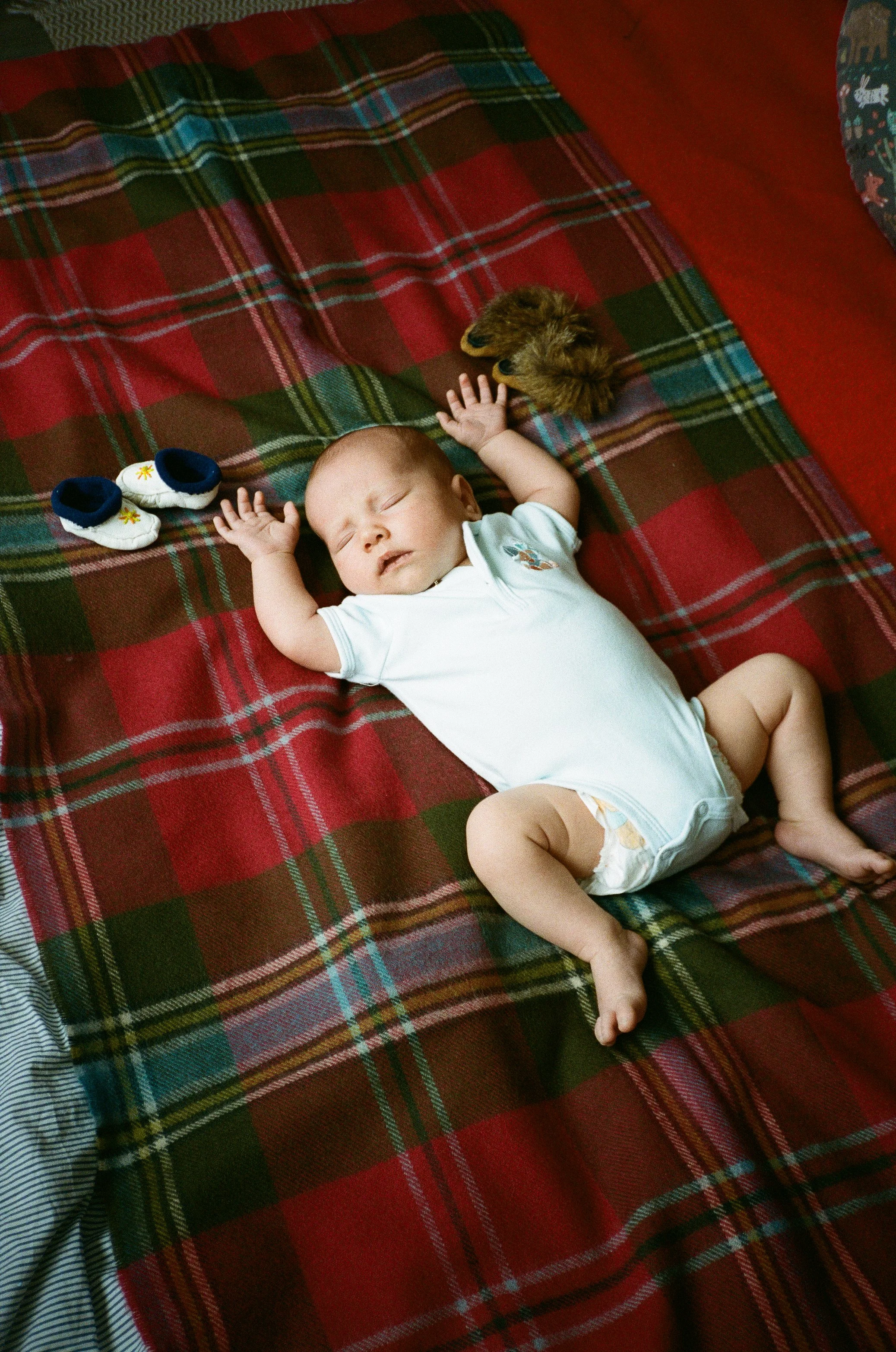 Candid family moments photographed on 35mm film by Ottawa analog photographer
