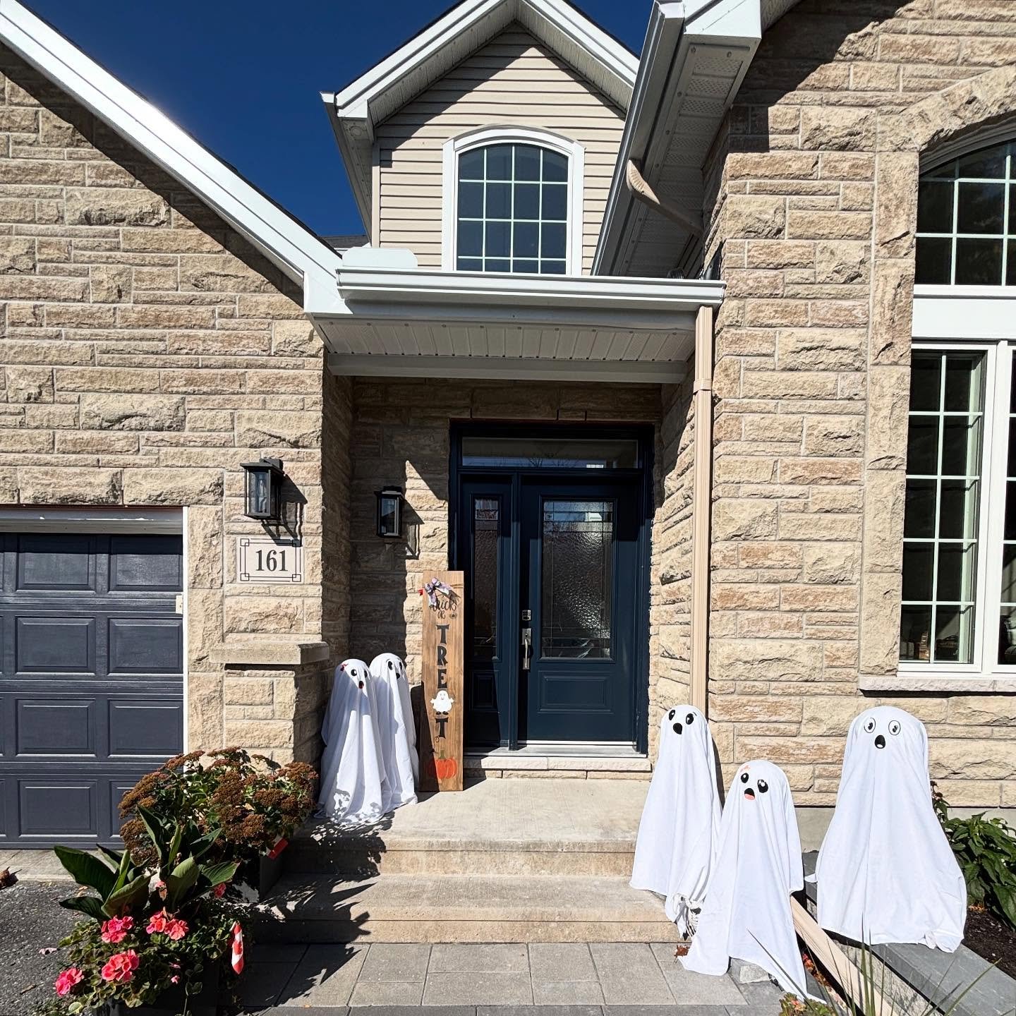 No tricks here &mdash; just stunning stonework that makes this home stand out from the crowd. 🎃 

Every stone around the garage door and window was laid with intention, giving this fa&ccedil;ade the kind of detail that turns heads (even the ghostly 